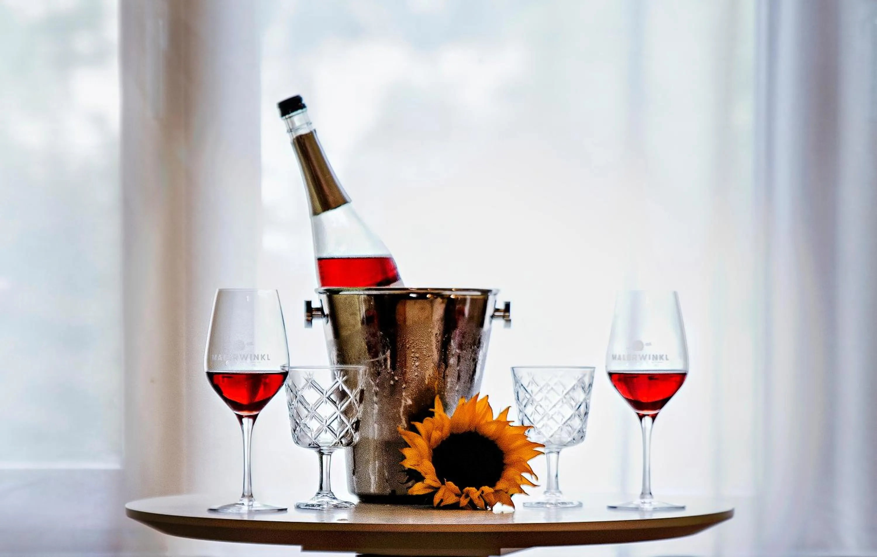 Alcoholic drinks in Malerwinkl Restaurant + Kunsthotel