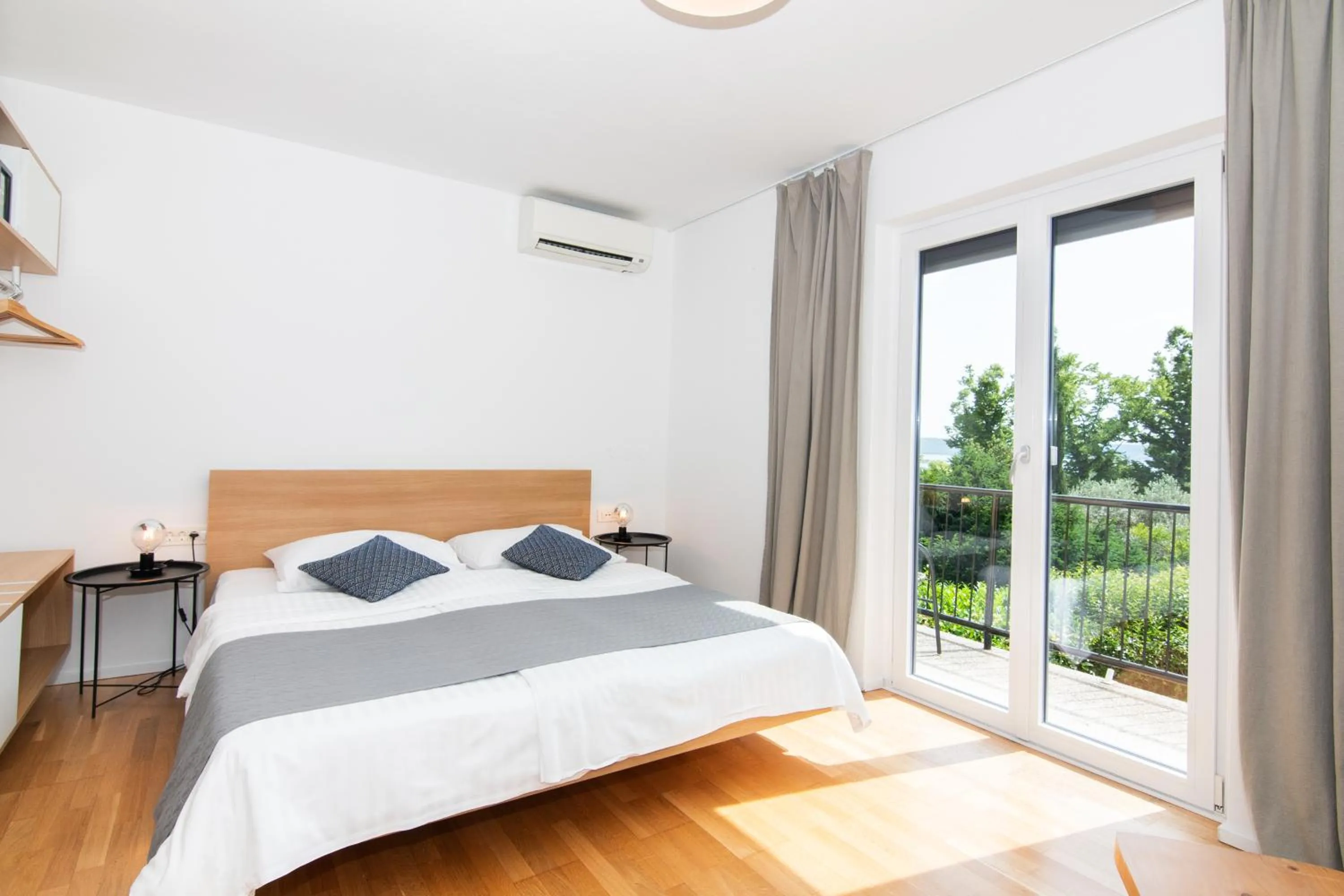 Bed in Forgotten Garden Apartments Portoroz