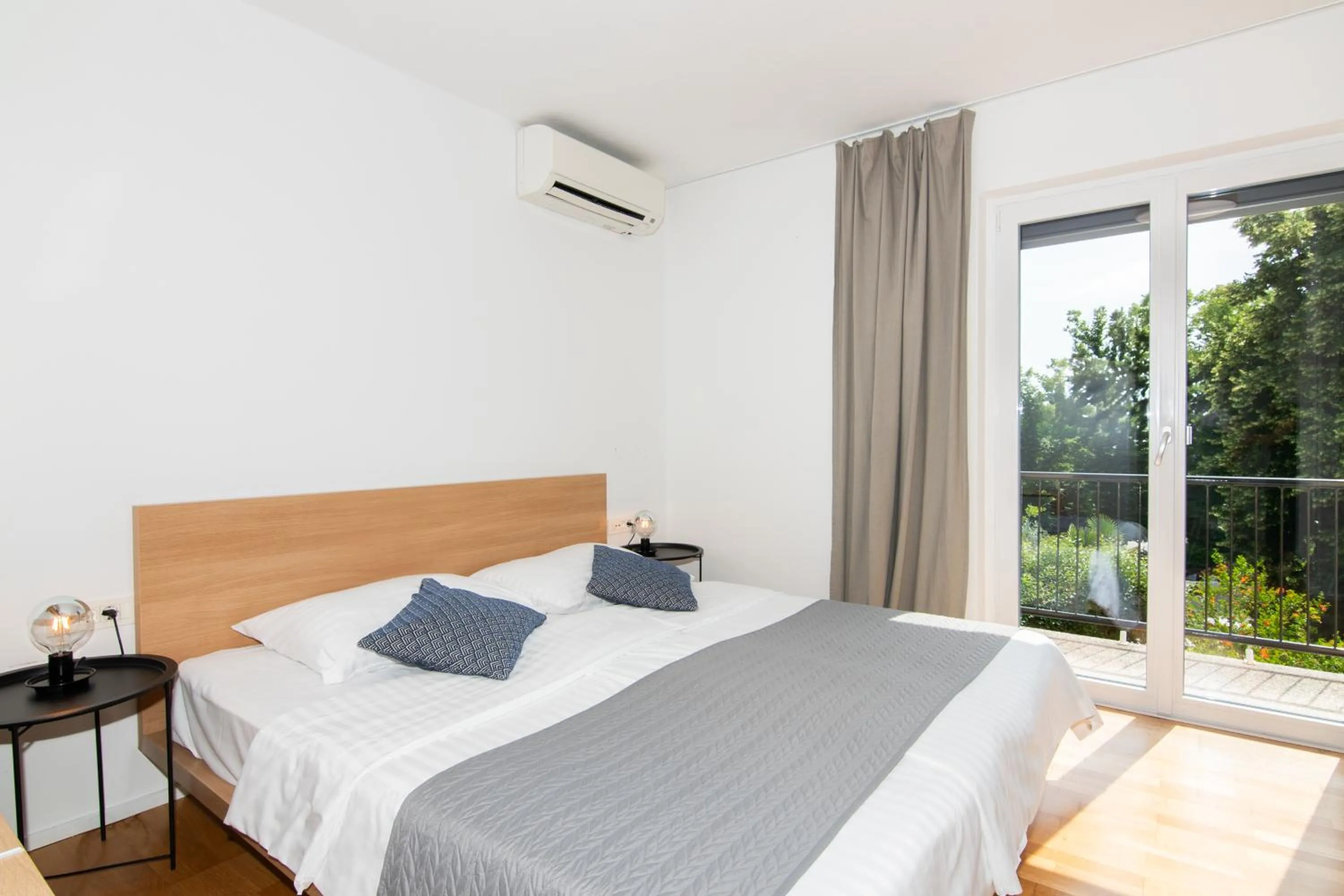 Bed in Forgotten Garden Apartments Portoroz