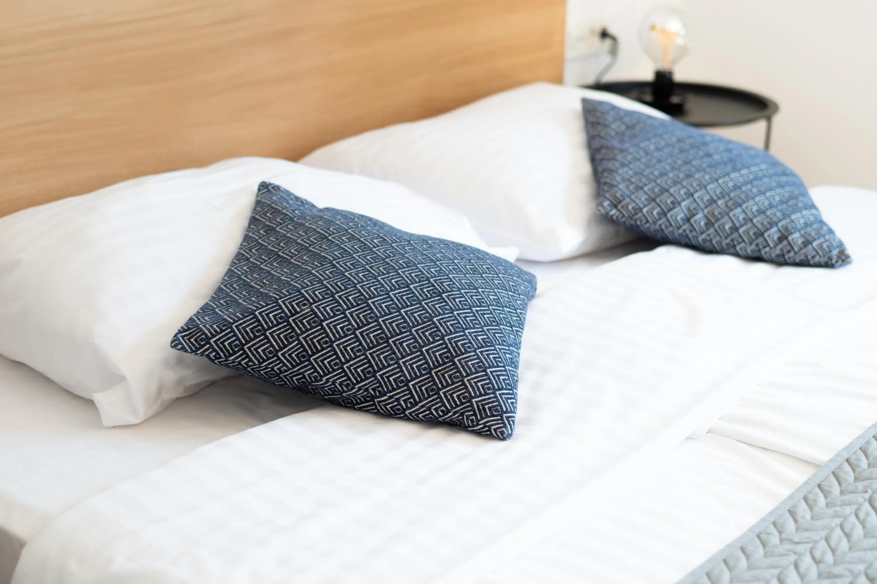 Bed in Forgotten Garden Apartments Portoroz