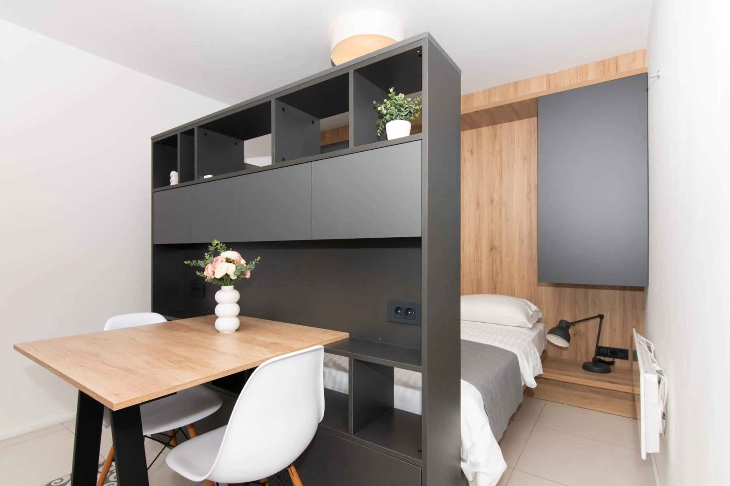 Bed in Forgotten Garden Apartments Portoroz