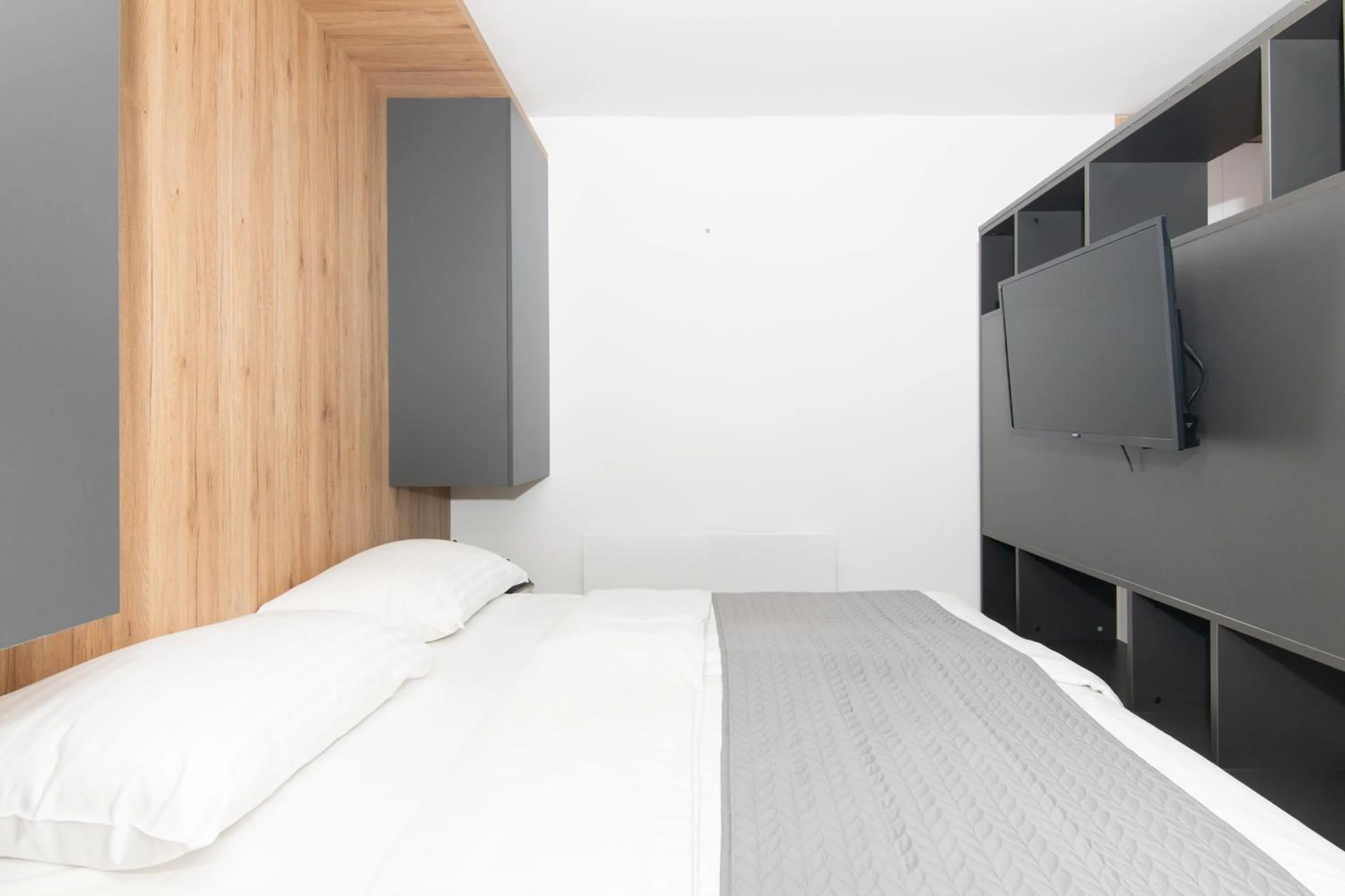 Bed in Forgotten Garden Apartments Portoroz