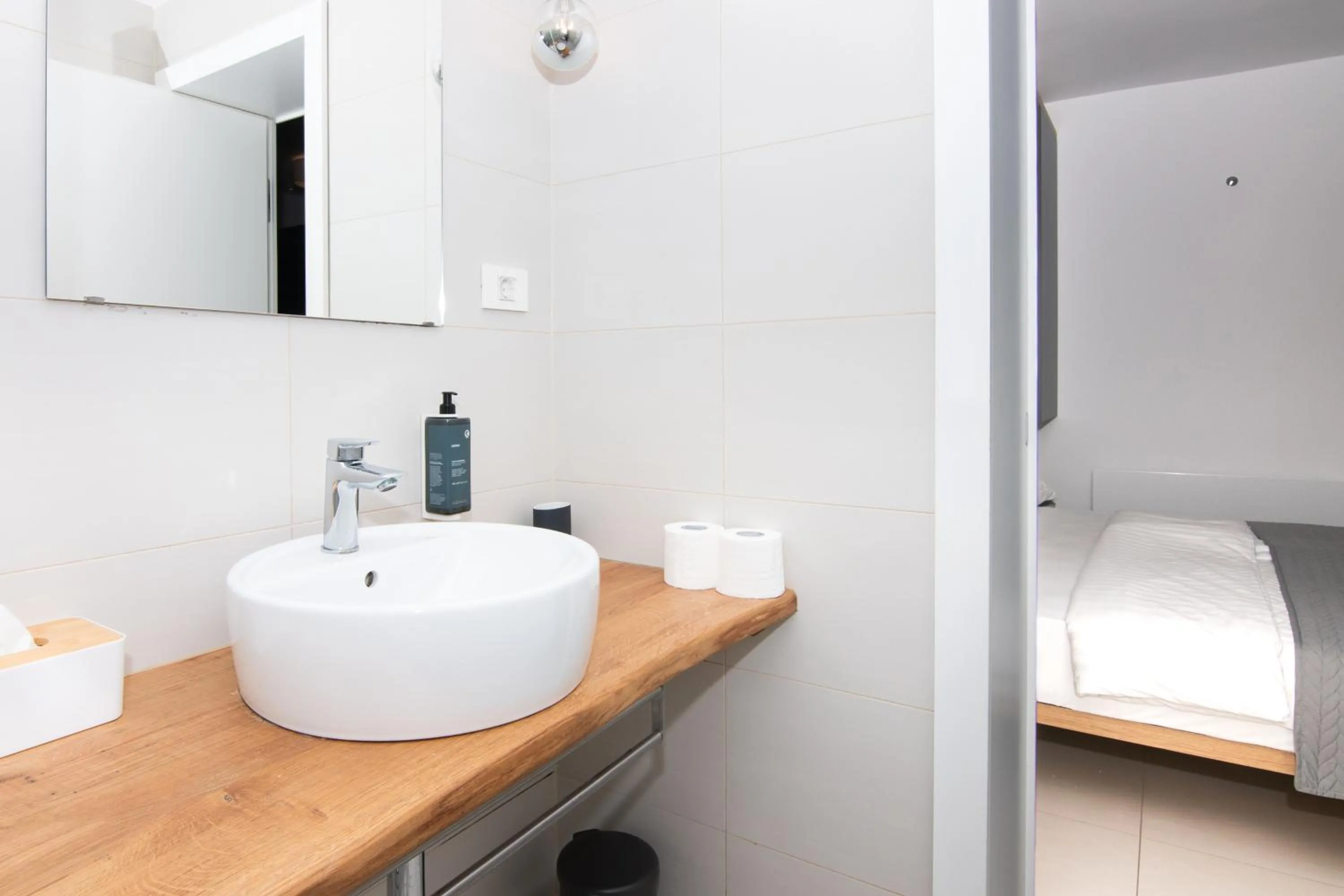 Bed in Forgotten Garden Apartments Portoroz