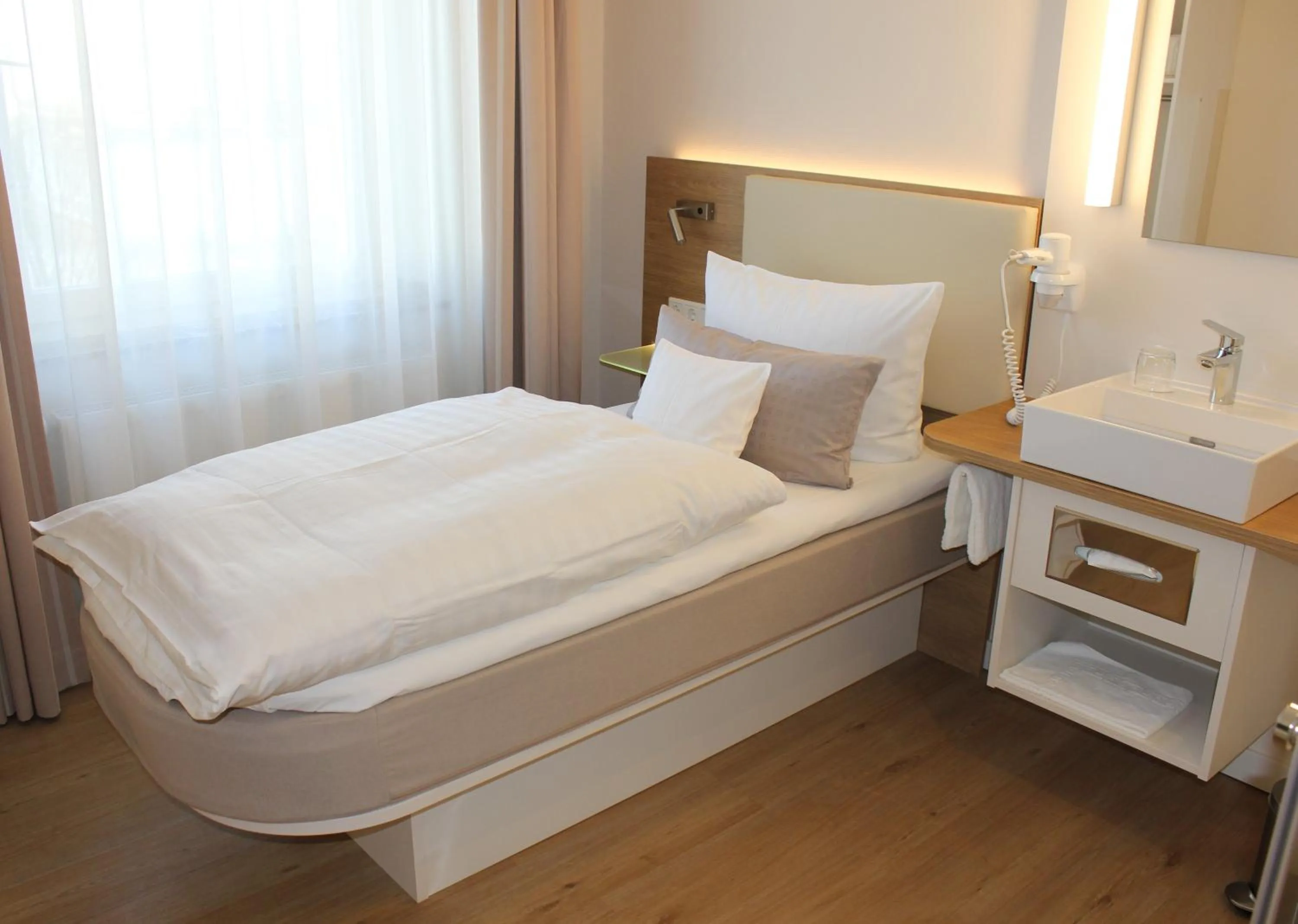 Photo of the whole room, Bed in Stüttgens Hotel
