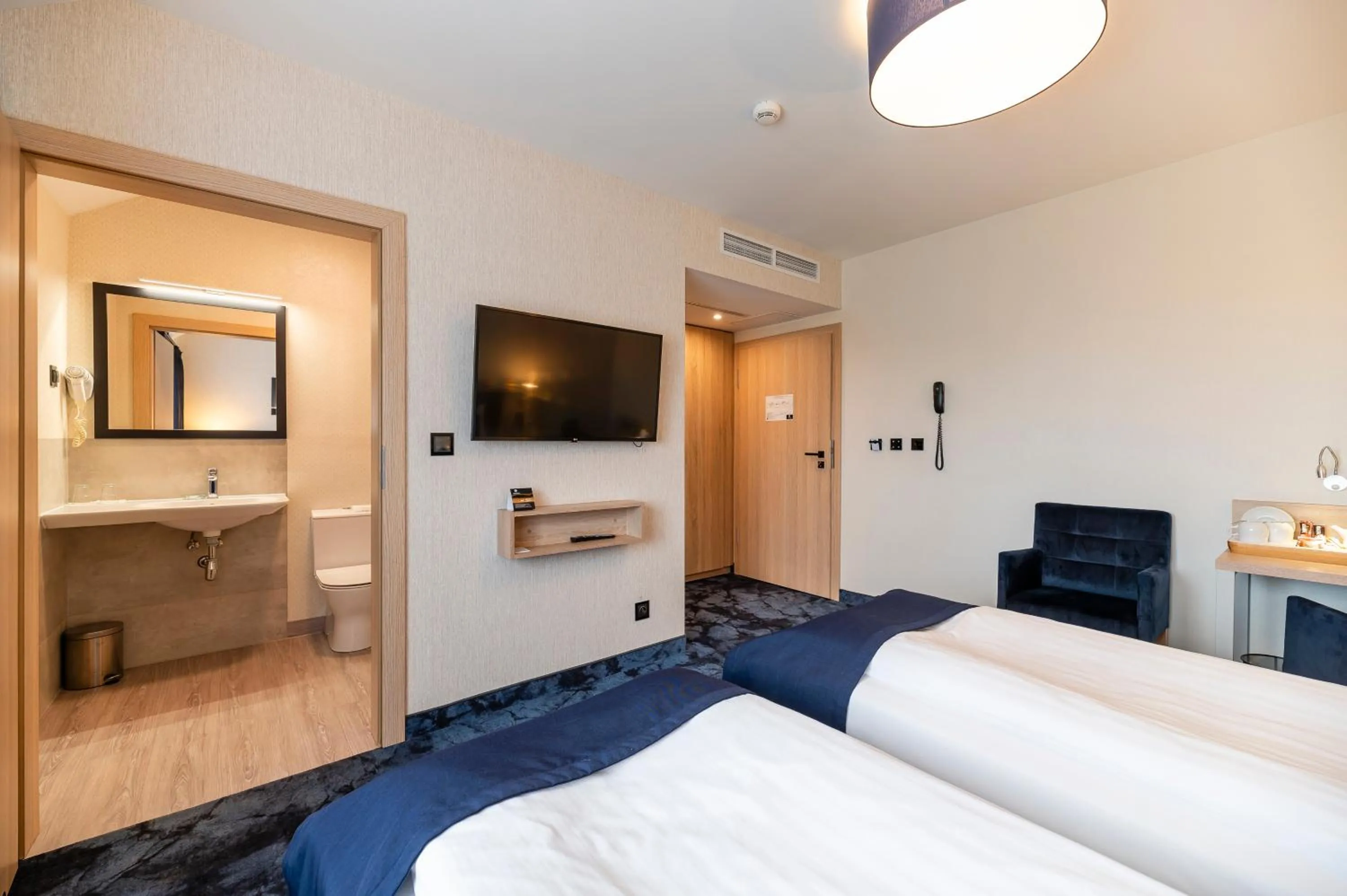 Bed in Ignasiak Hotel