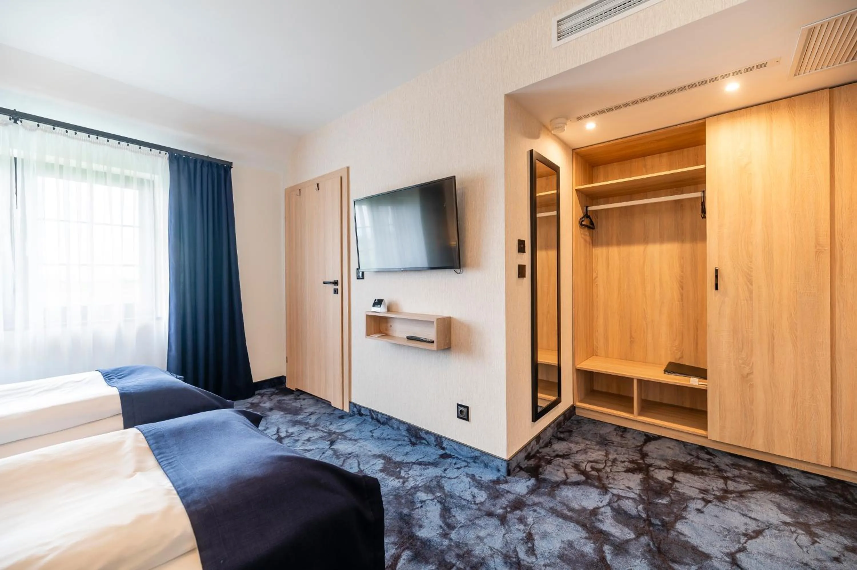 Bed in Ignasiak Hotel