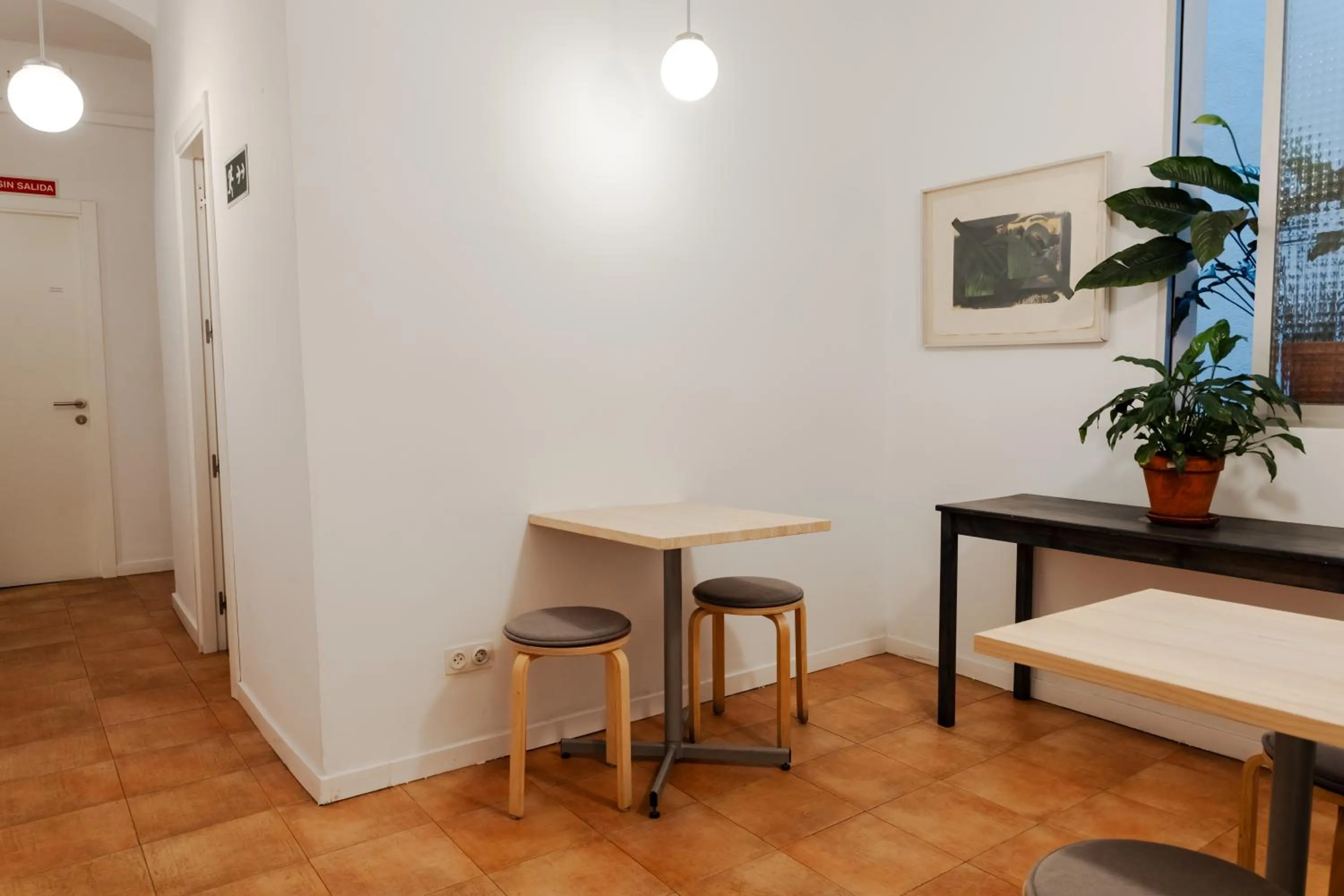 Seating area in Hostal La Zona