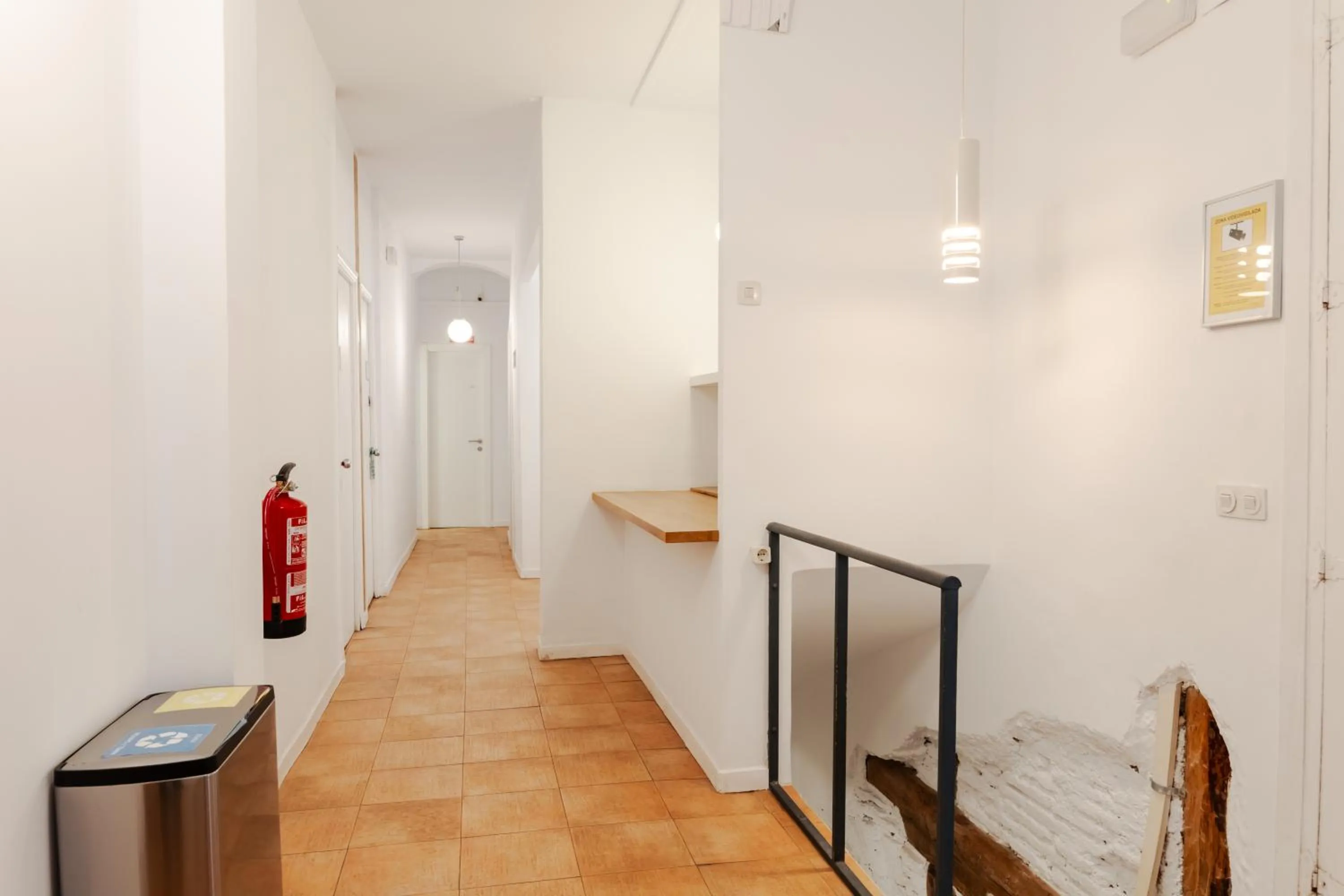 Seating area, Bed in Hostal La Zona