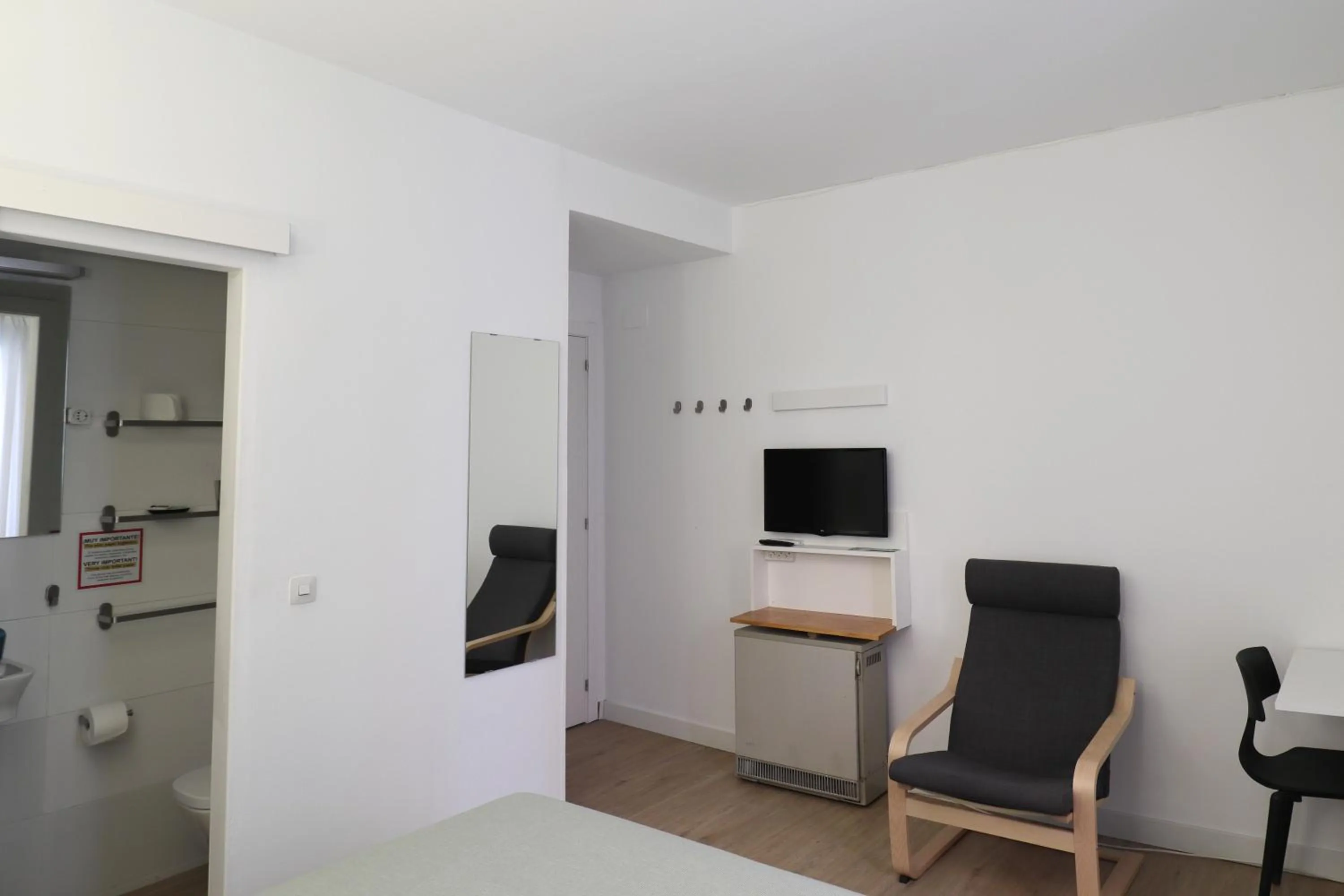 Bedroom in Hostal La Zona