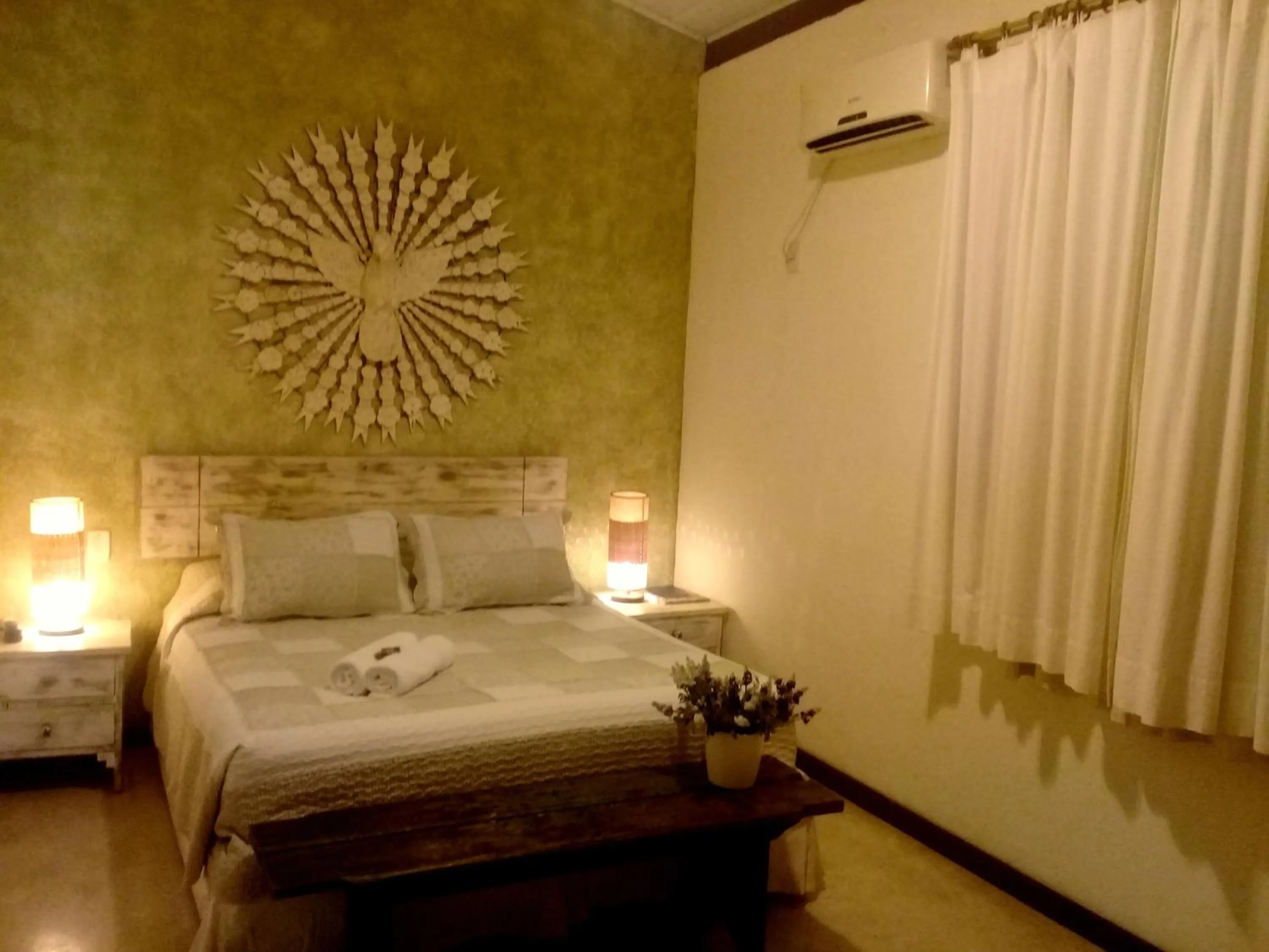 Bed in Pousada Rosa dos Ventos