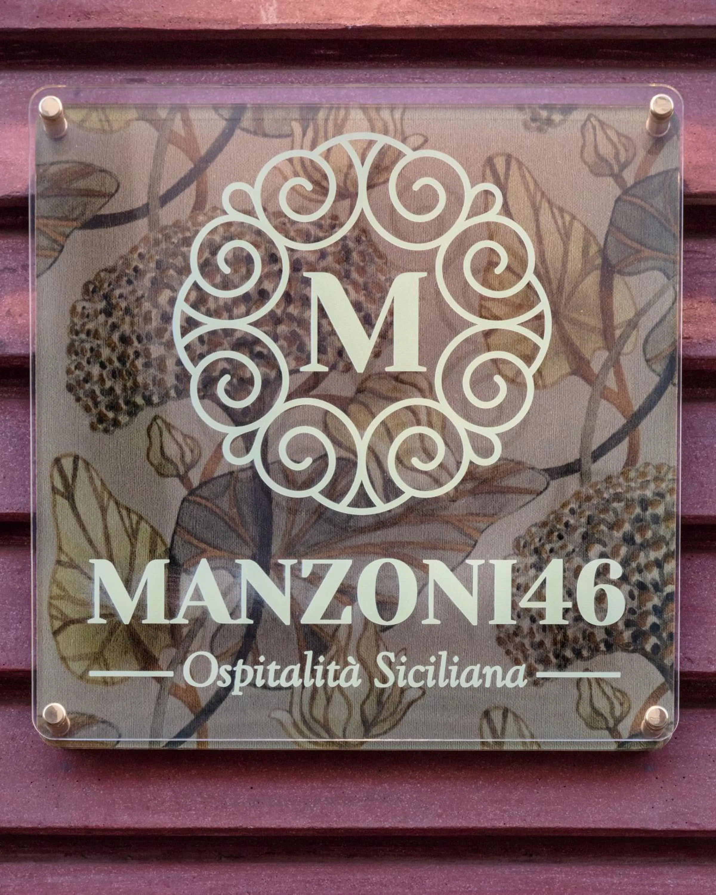 Property logo or sign in Manzoni 46 - Ospitalità siciliana
