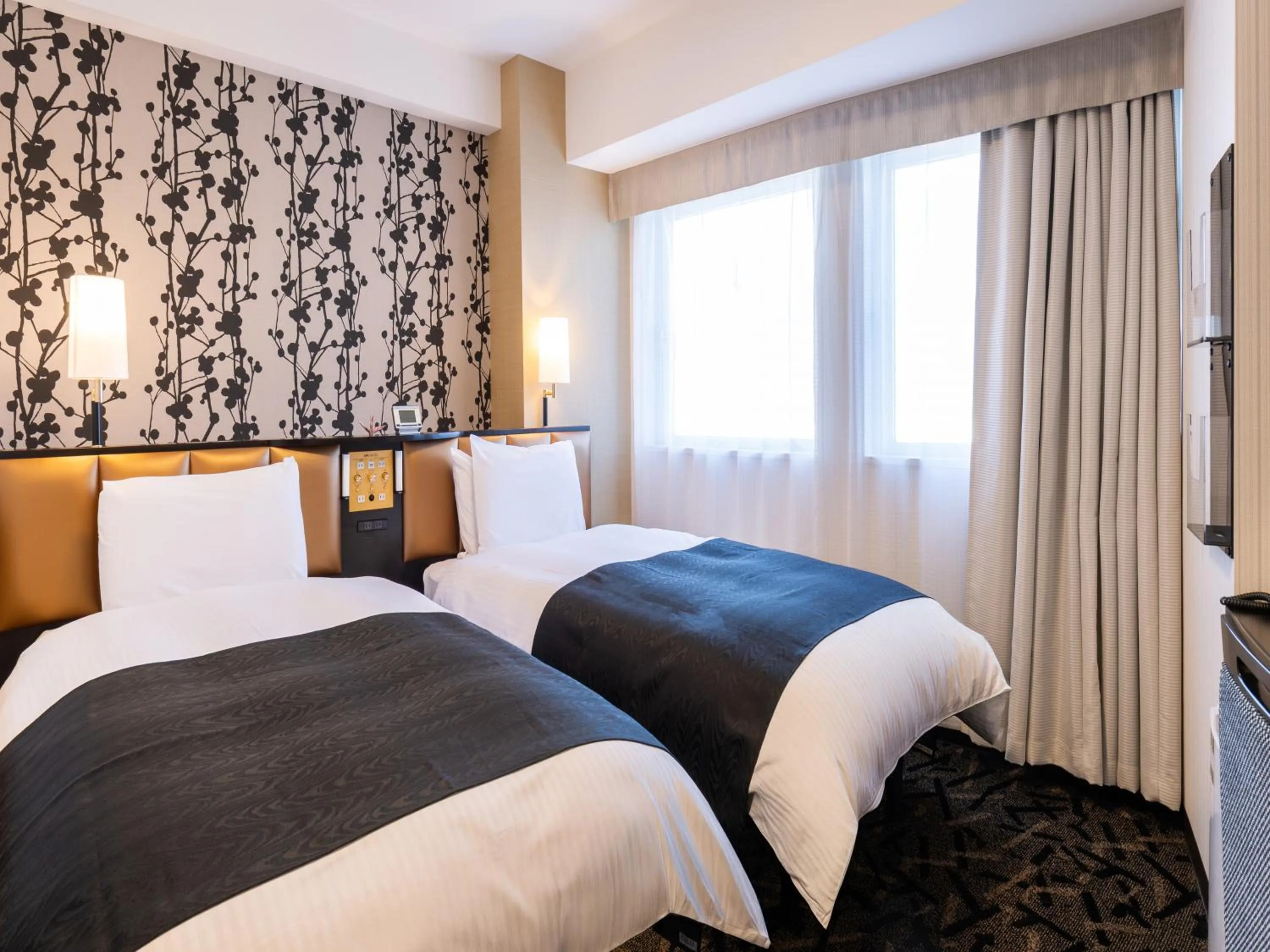 Photo of the whole room, Bed in APA Hotel Toyama Ekimae