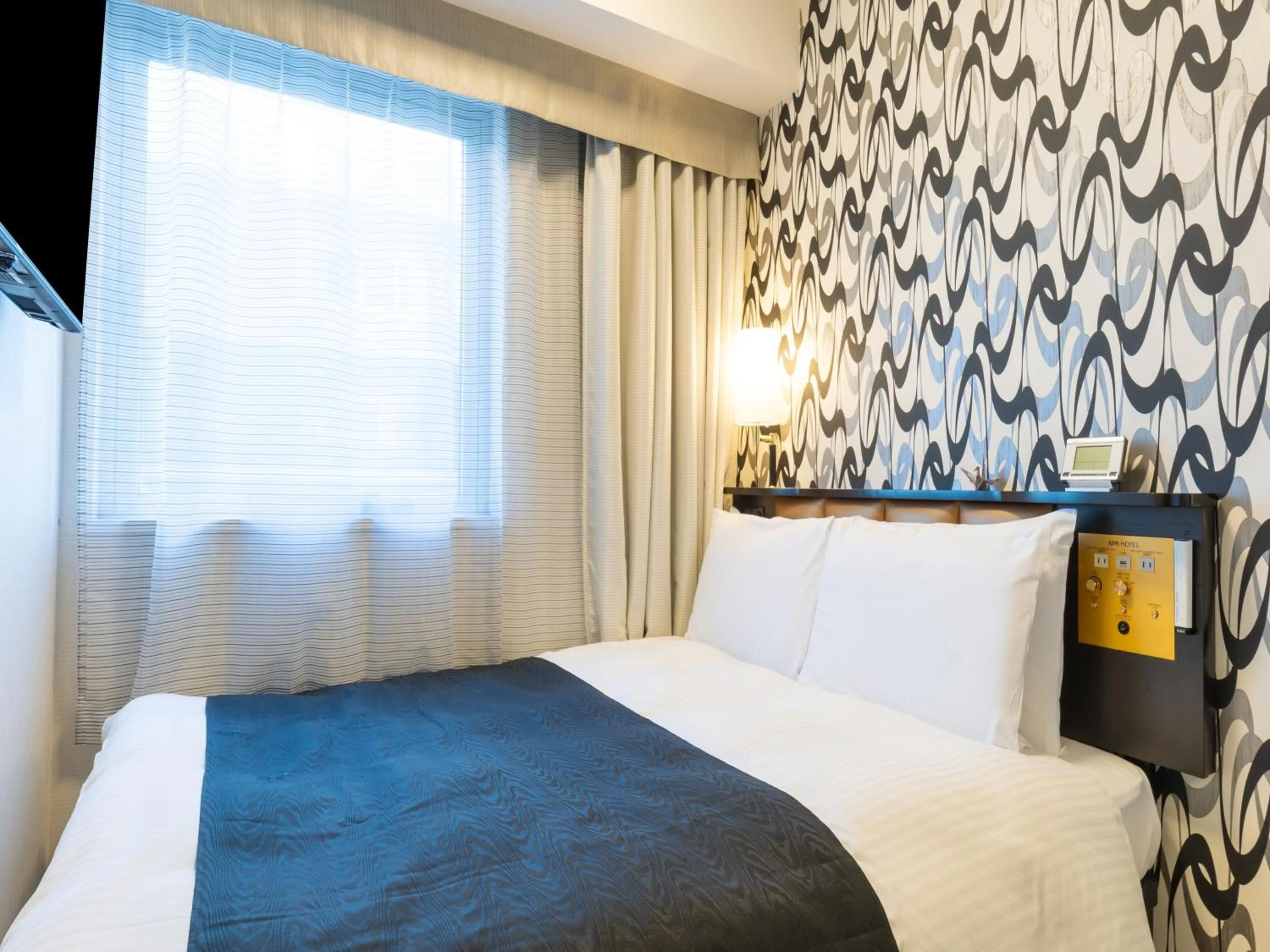 Photo of the whole room, Bed in APA Hotel Toyama Ekimae