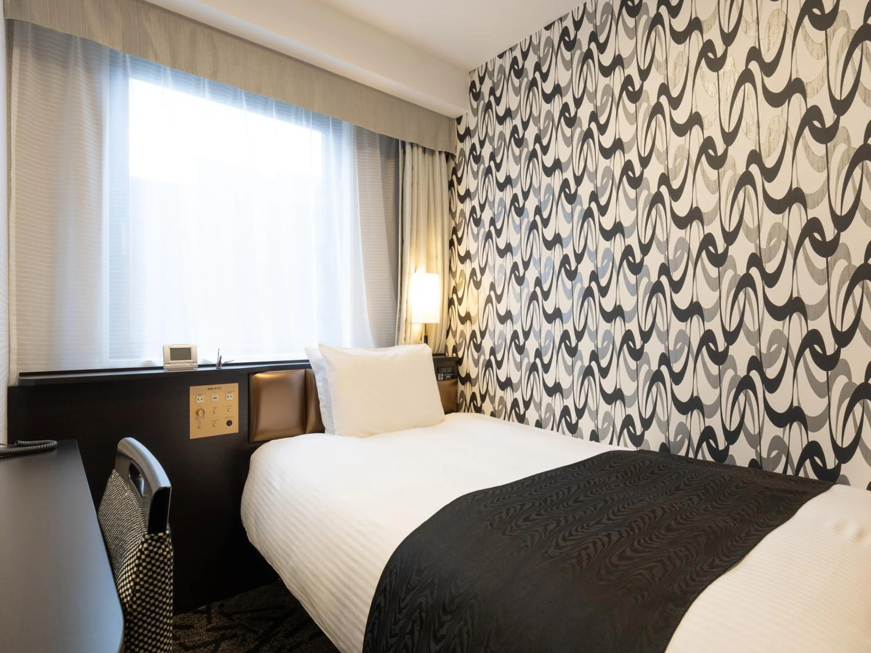 Photo of the whole room, Bed in APA Hotel Komatsu