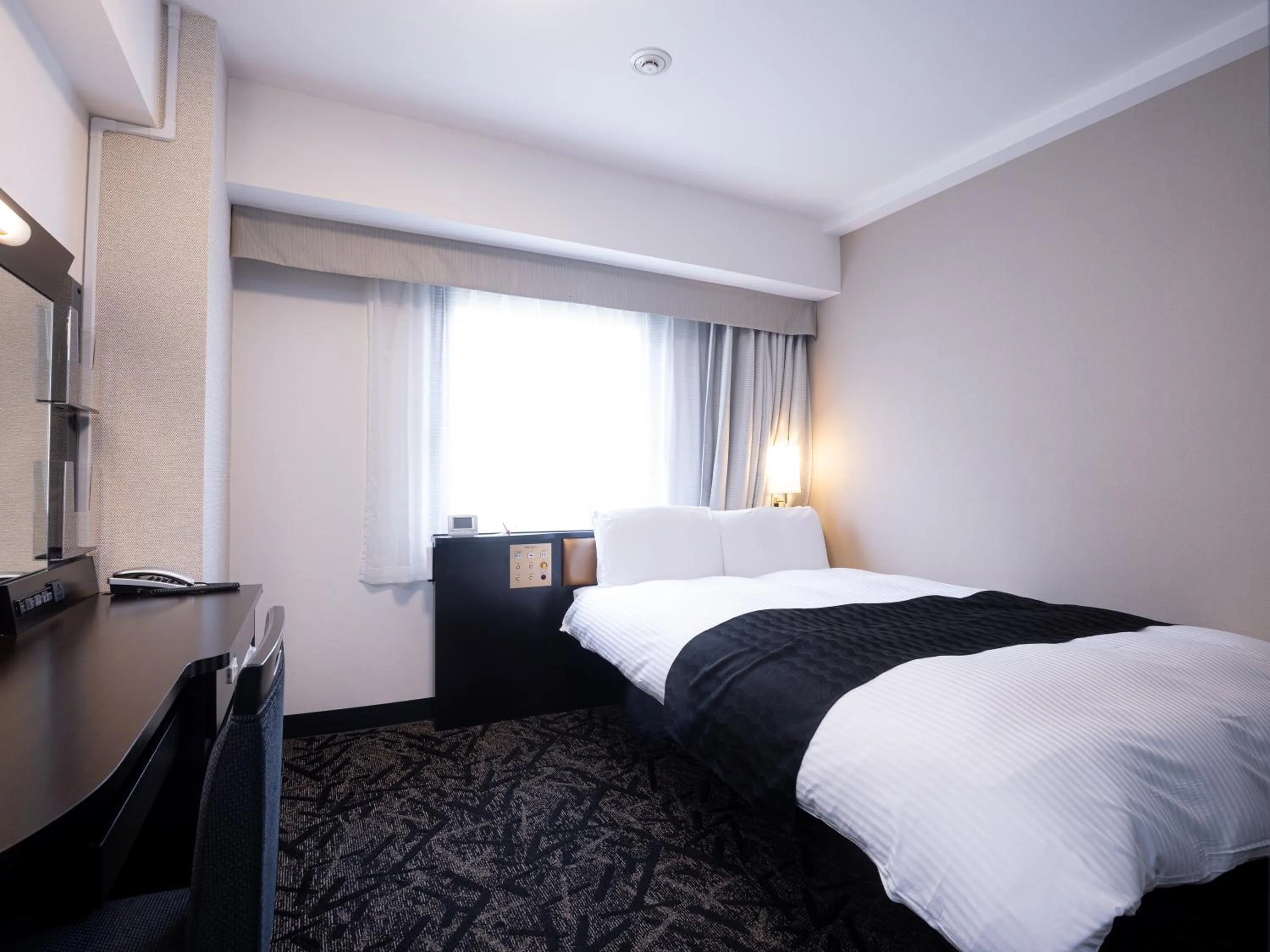 Photo of the whole room, Bed in APA Hotel Nagoya Sakae Ekimae EXCELLENT