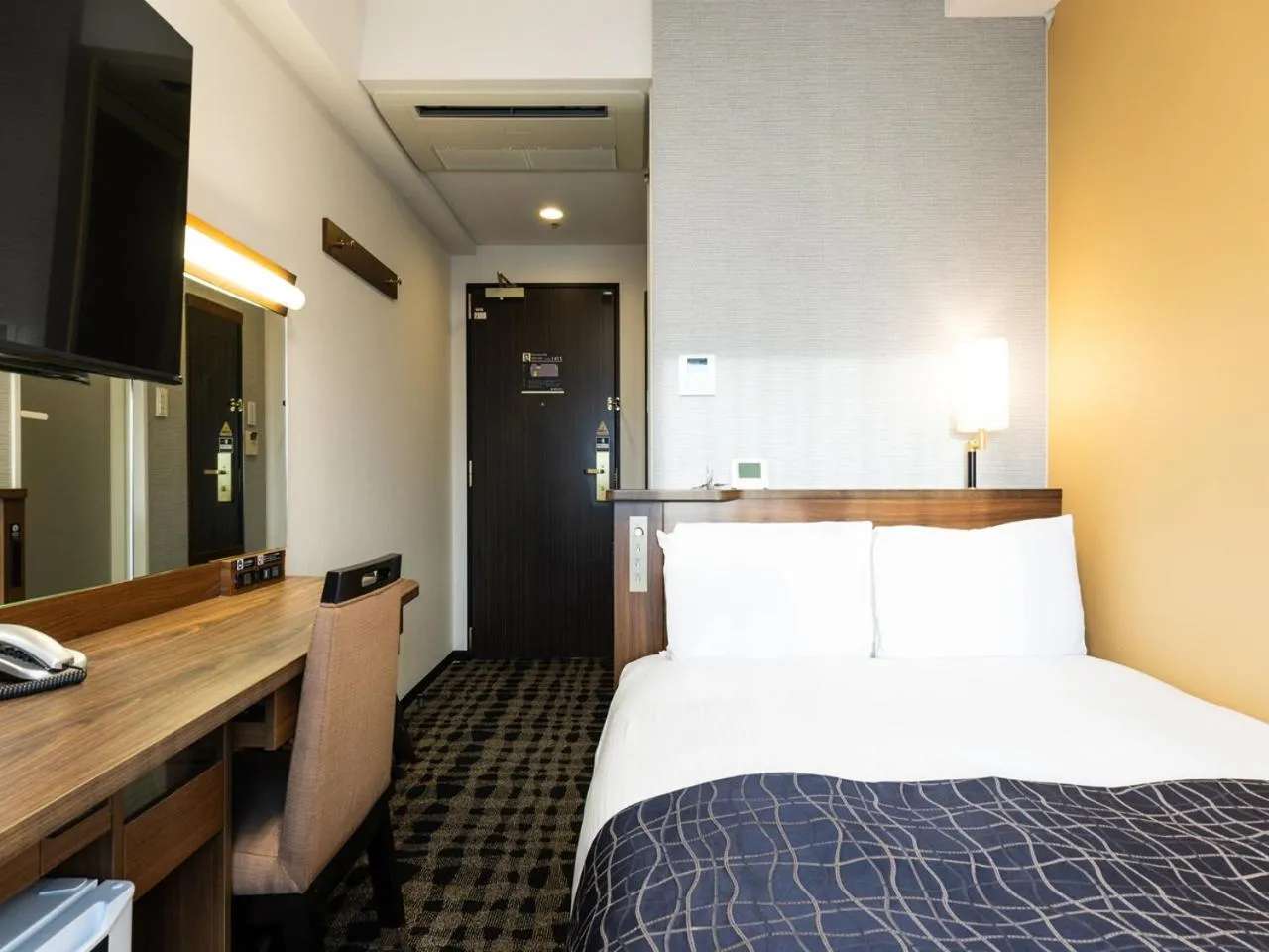 Photo of the whole room, Bed in APA Hotel Toyama Ekimae Minami