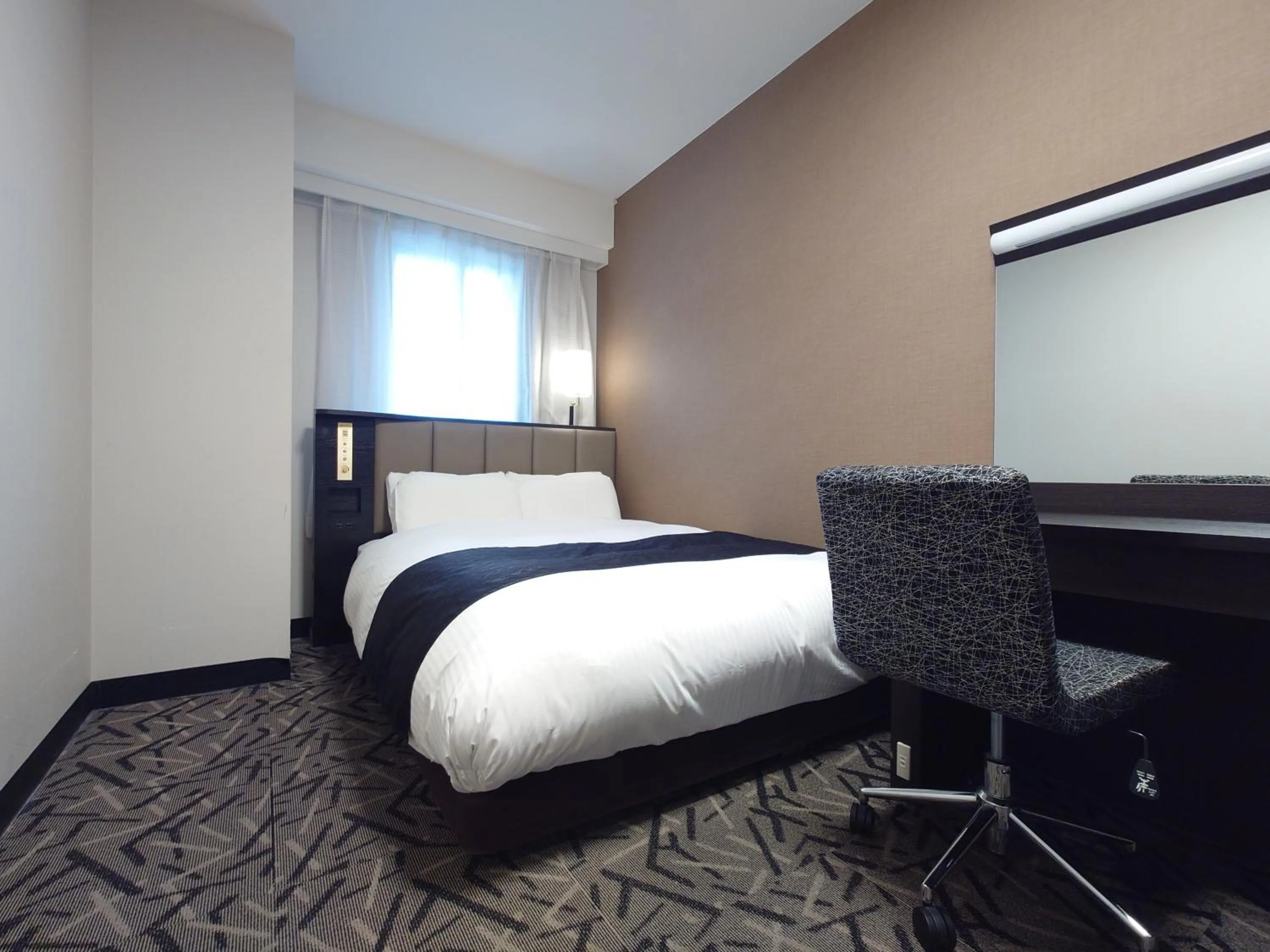 Photo of the whole room, Bed in APA Hotel Yamaguchi Hofu