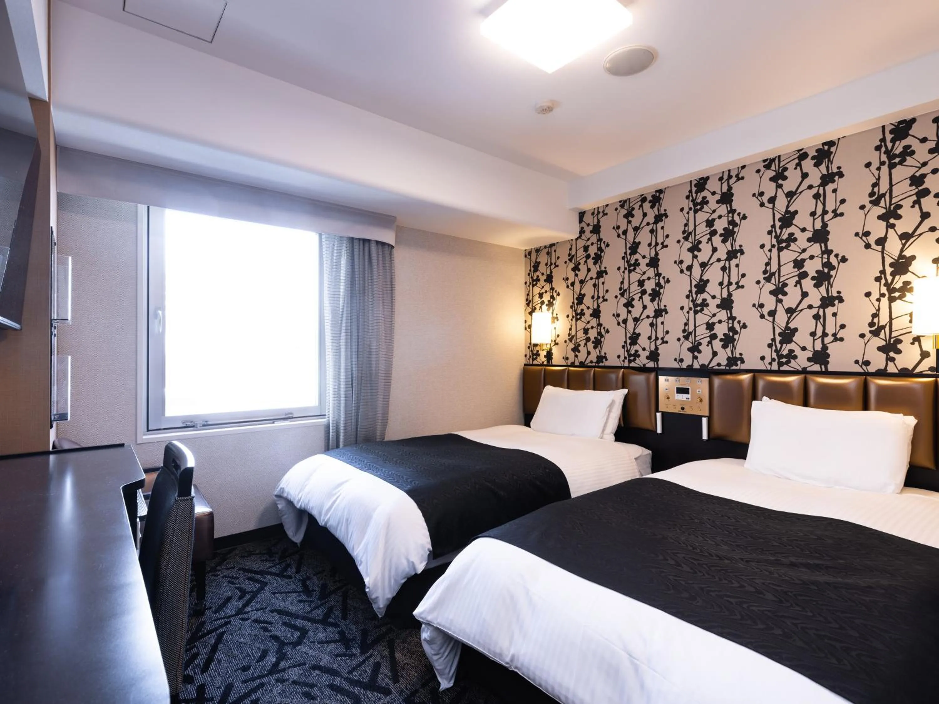 Photo of the whole room, Bed in APA Hotel Nagoya Sakae
