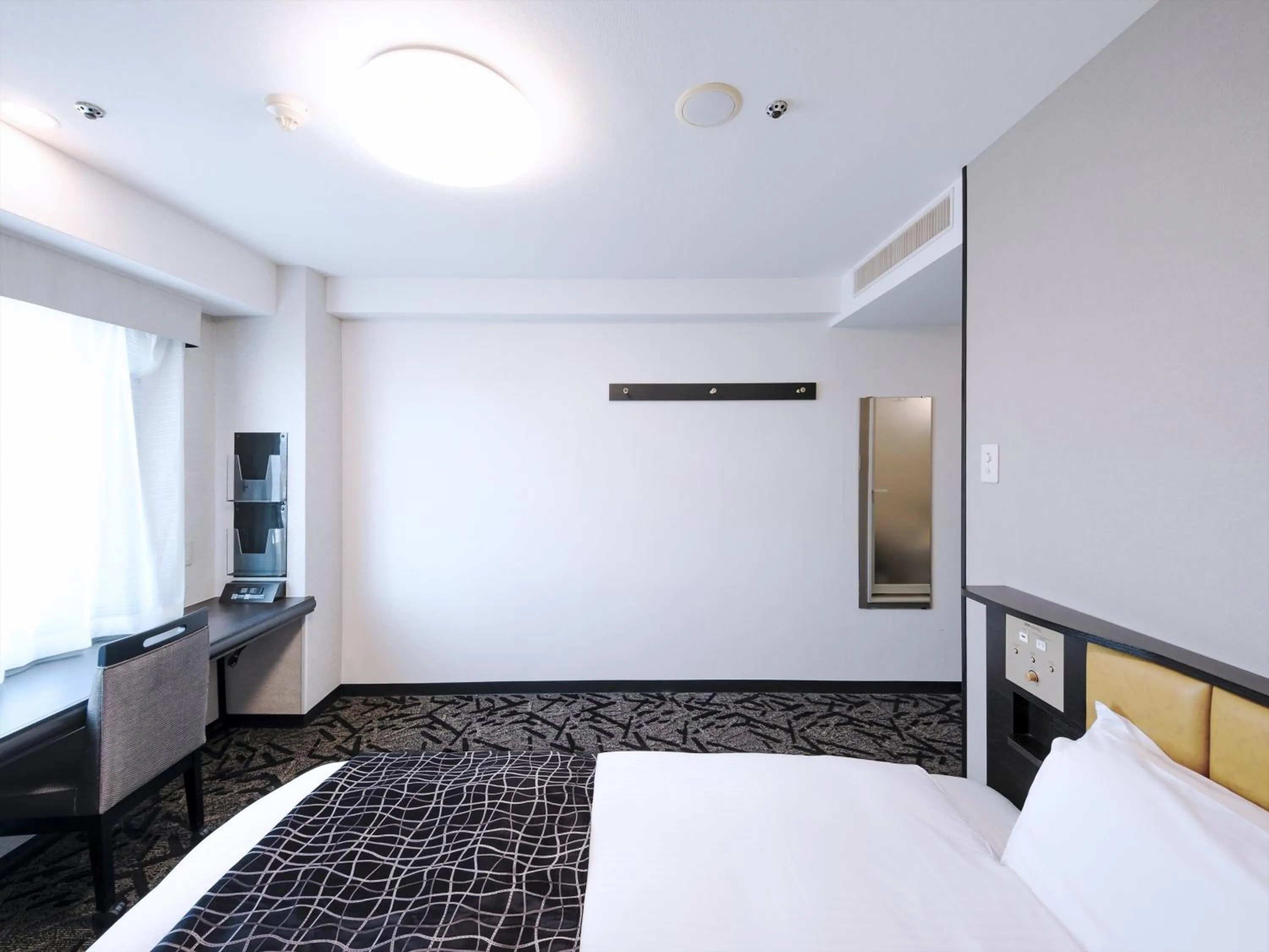 Photo of the whole room, Bed in APA Hotel Tottori Ekimae Minami