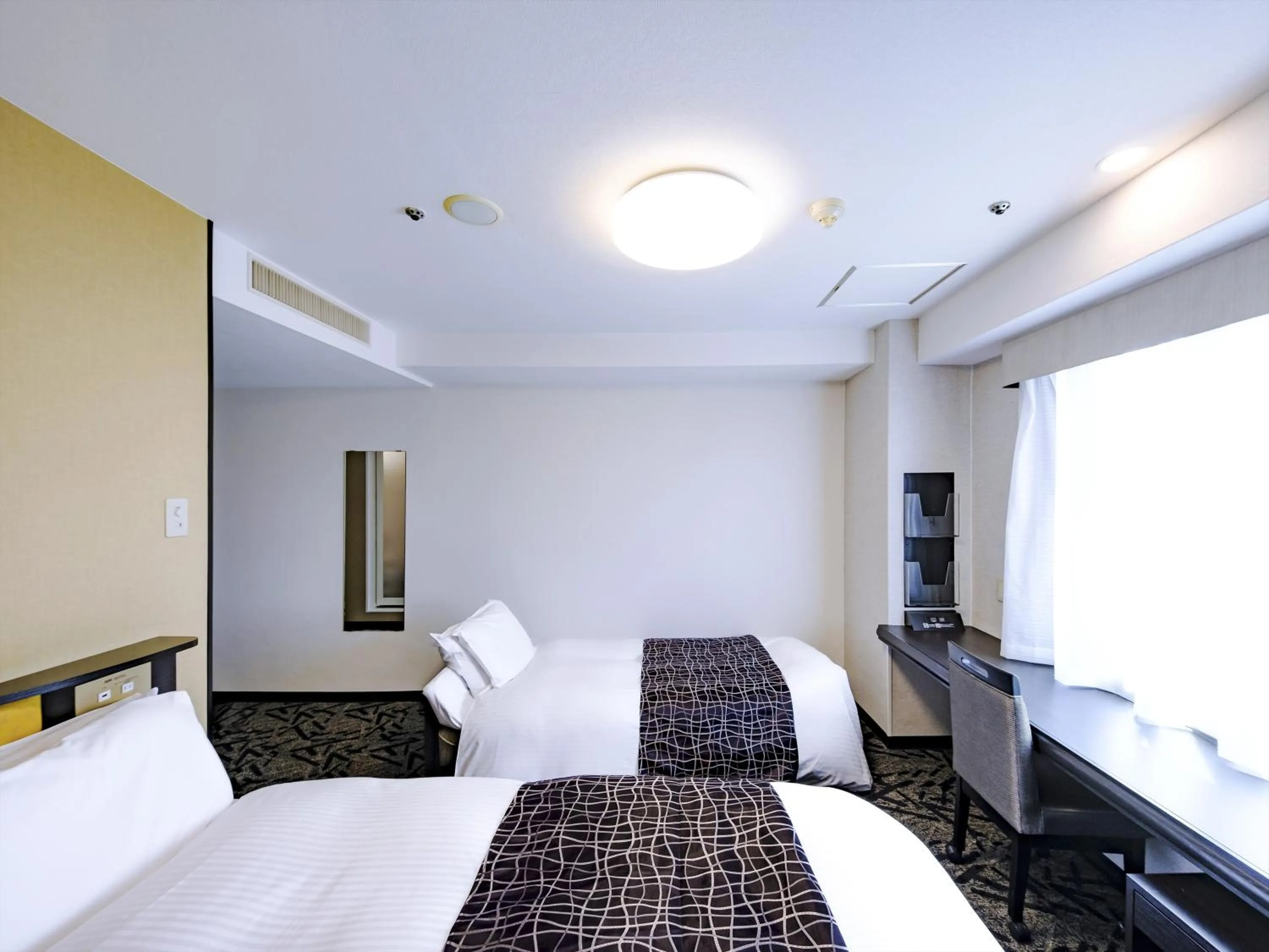 Photo of the whole room, Bed in APA Hotel Tottori Ekimae Minami