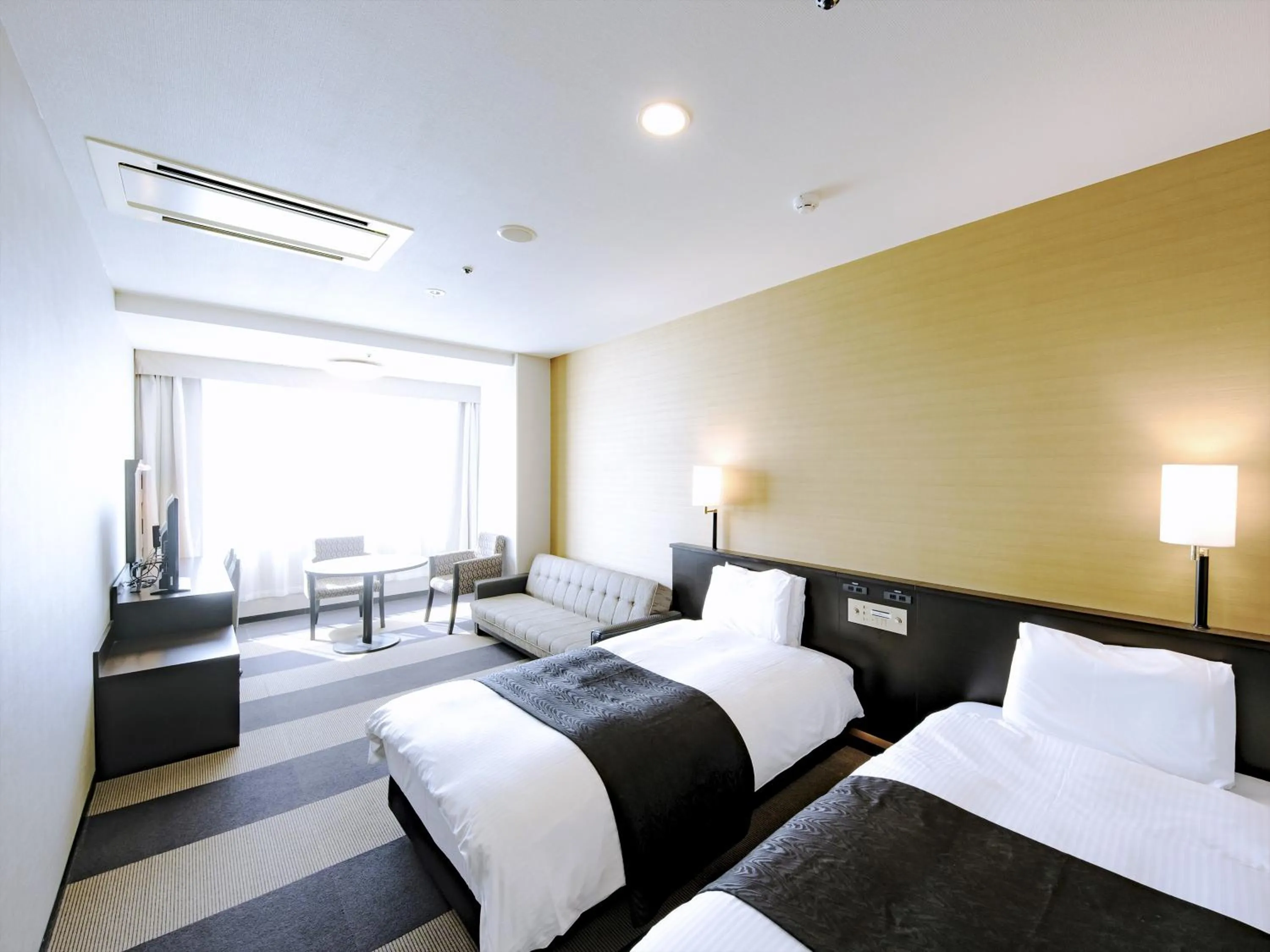 Photo of the whole room, Bed in APA Hotel Tottori Ekimae Minami