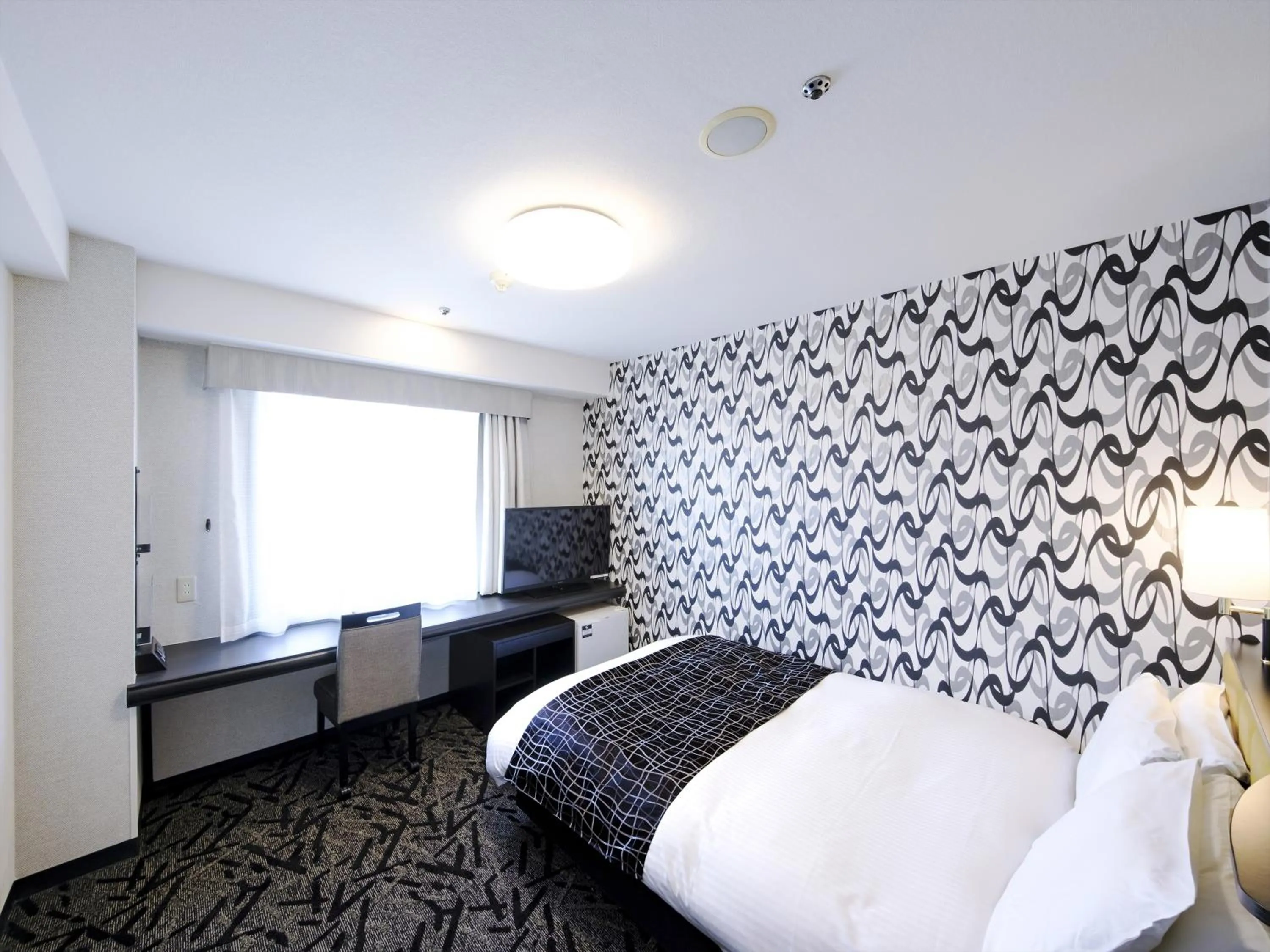 Photo of the whole room, Bed in APA Hotel Tottori Ekimae Minami