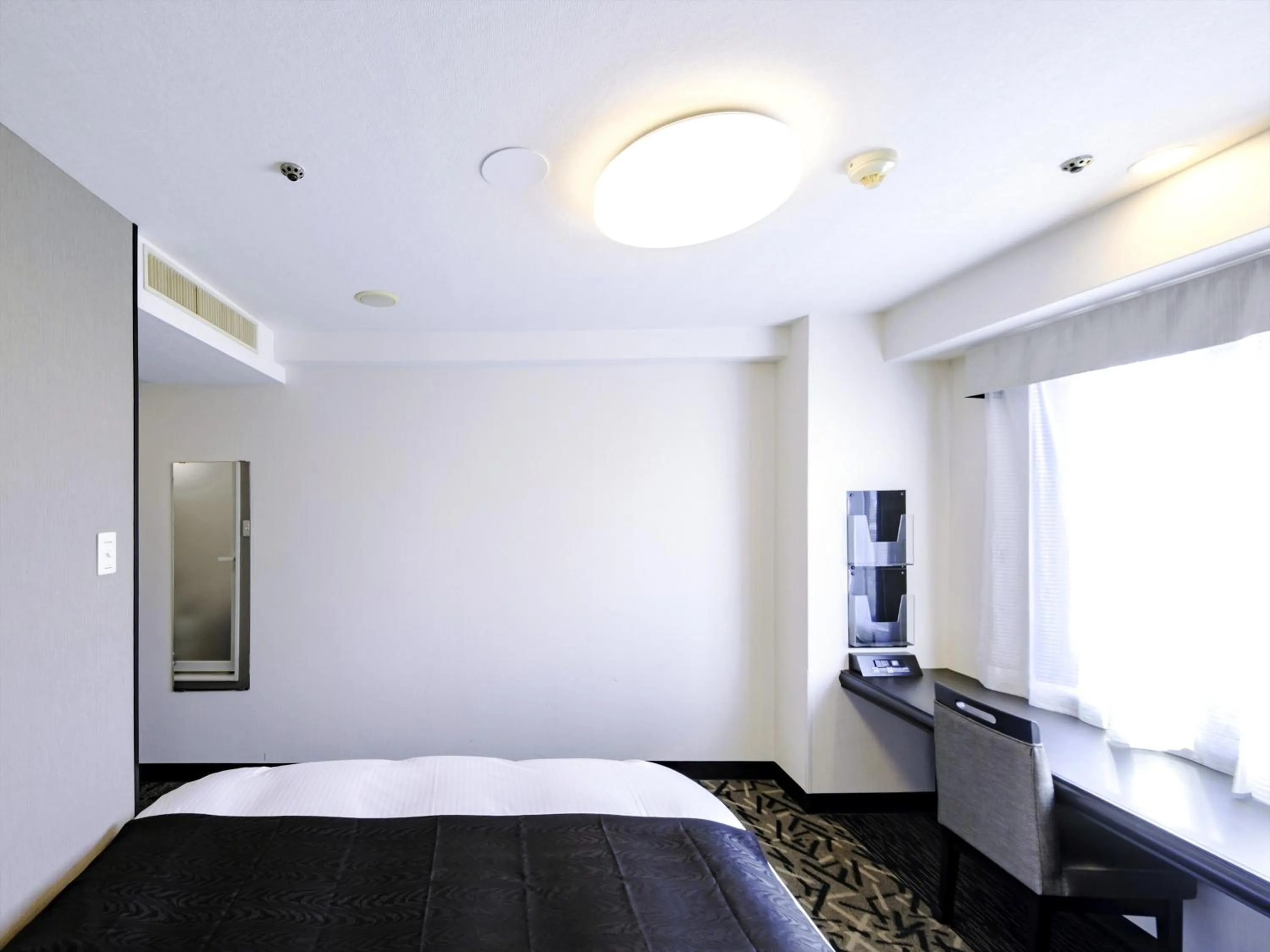 Photo of the whole room, Bed in APA Hotel Tottori Ekimae Minami