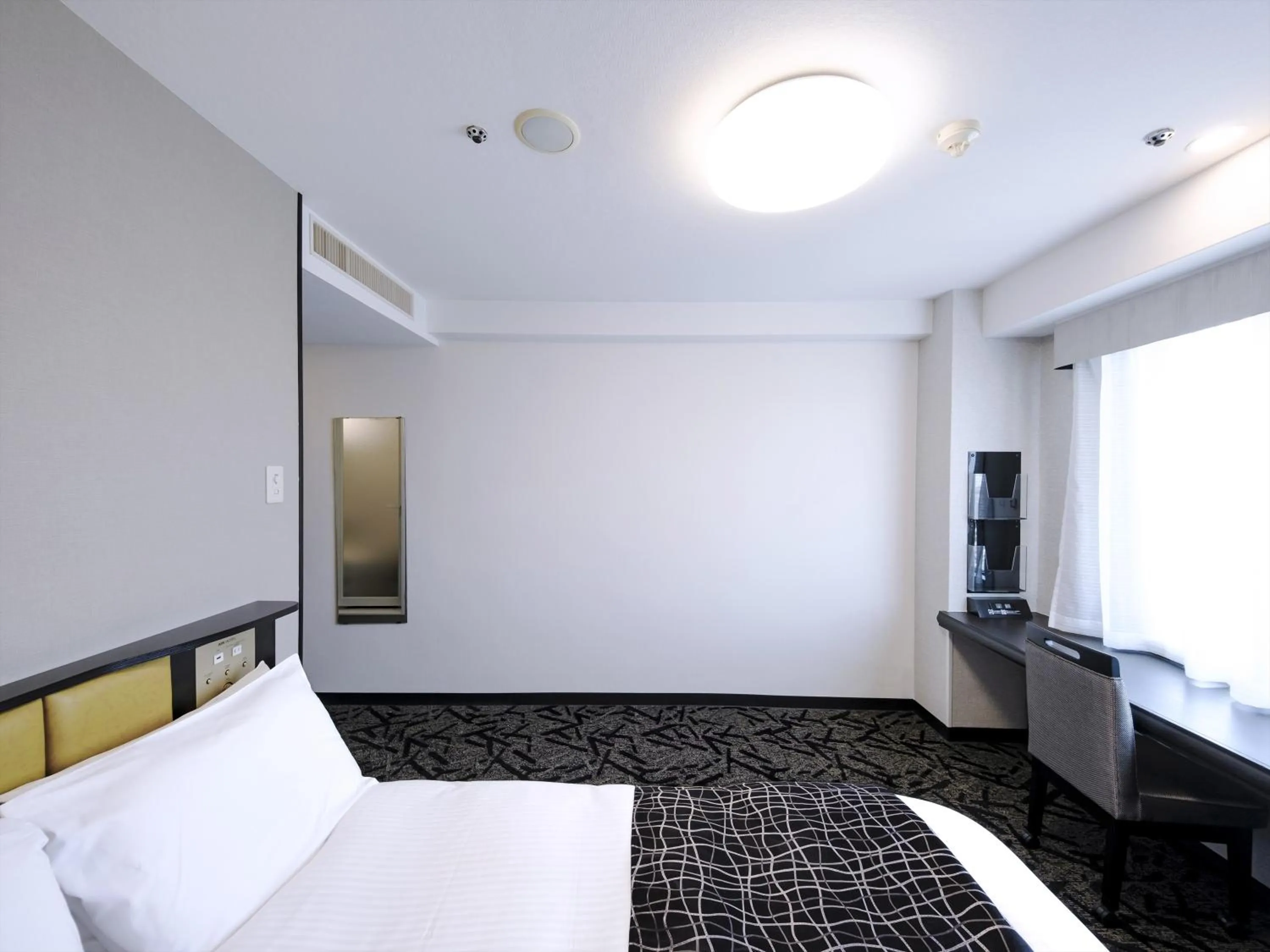 Photo of the whole room, Bed in APA Hotel Tottori Ekimae Minami