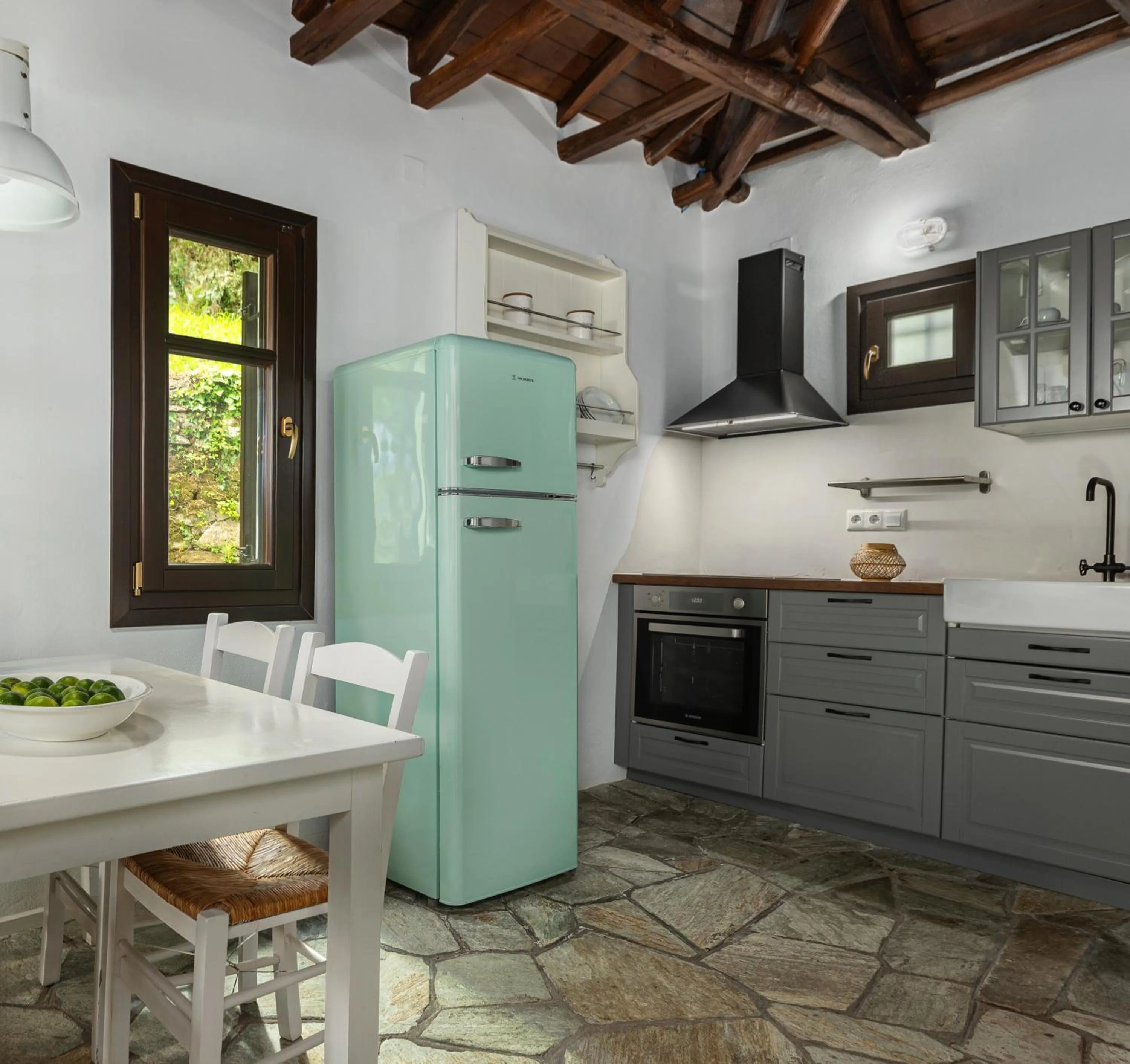 Kitchen or kitchenette in Aeolos Hotel & Villas - Pelion