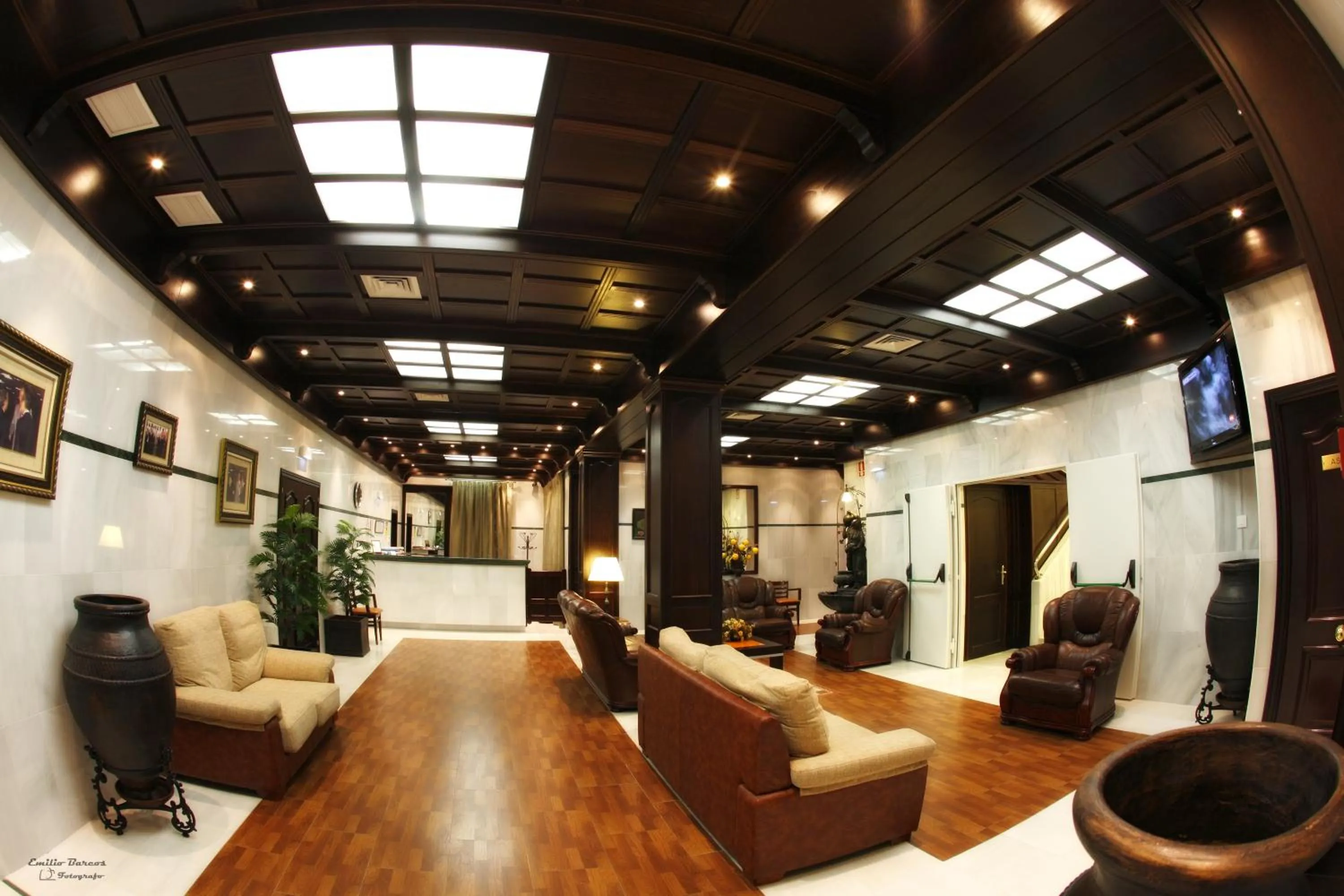 Communal lounge/ TV room in Hotel Las Acacias