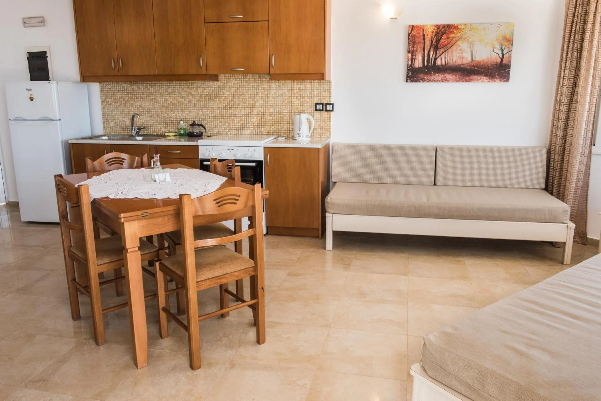 Living room in Mythos Beach Hotel Apartments