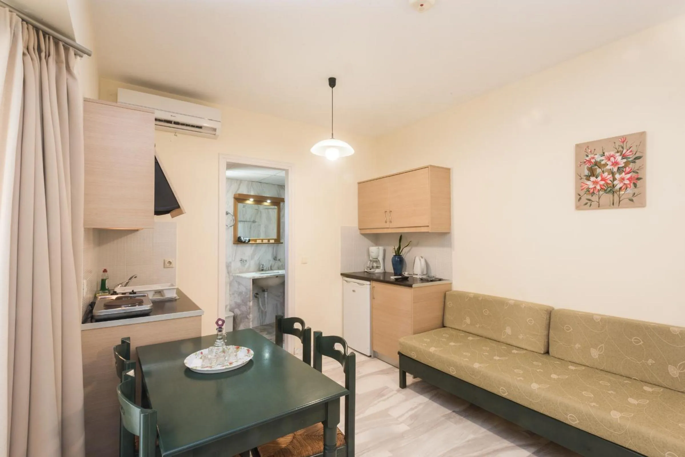 Living room in Mythos Beach Hotel Apartments