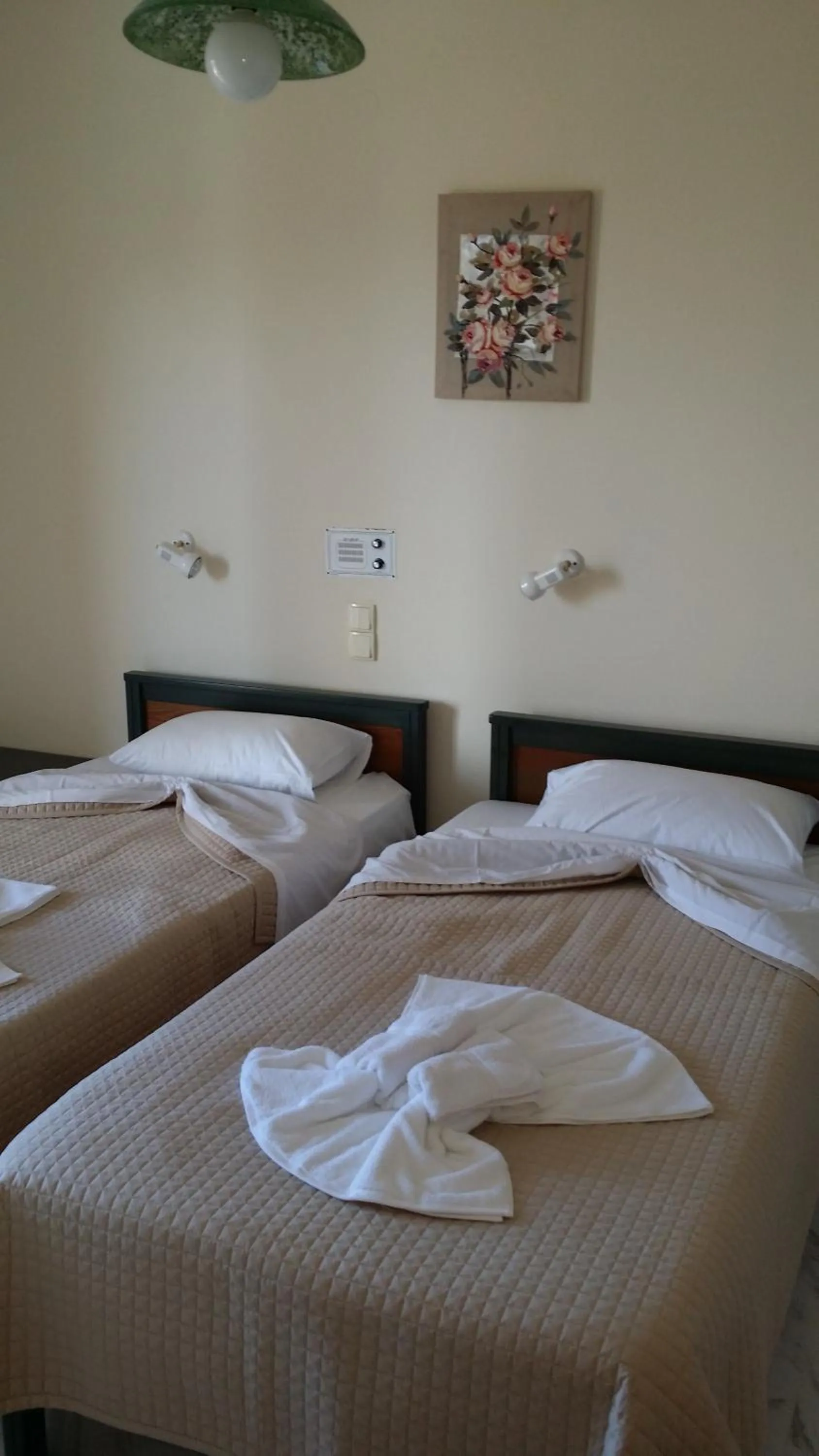 Bed in Mythos Beach Hotel Apartments