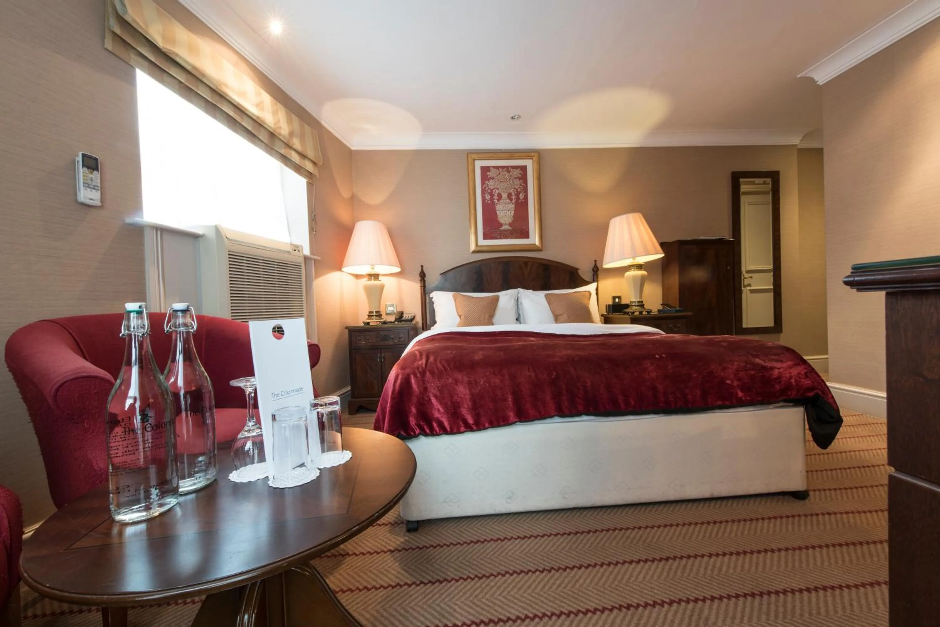 Photo of the whole room, Bed in The Colonnade