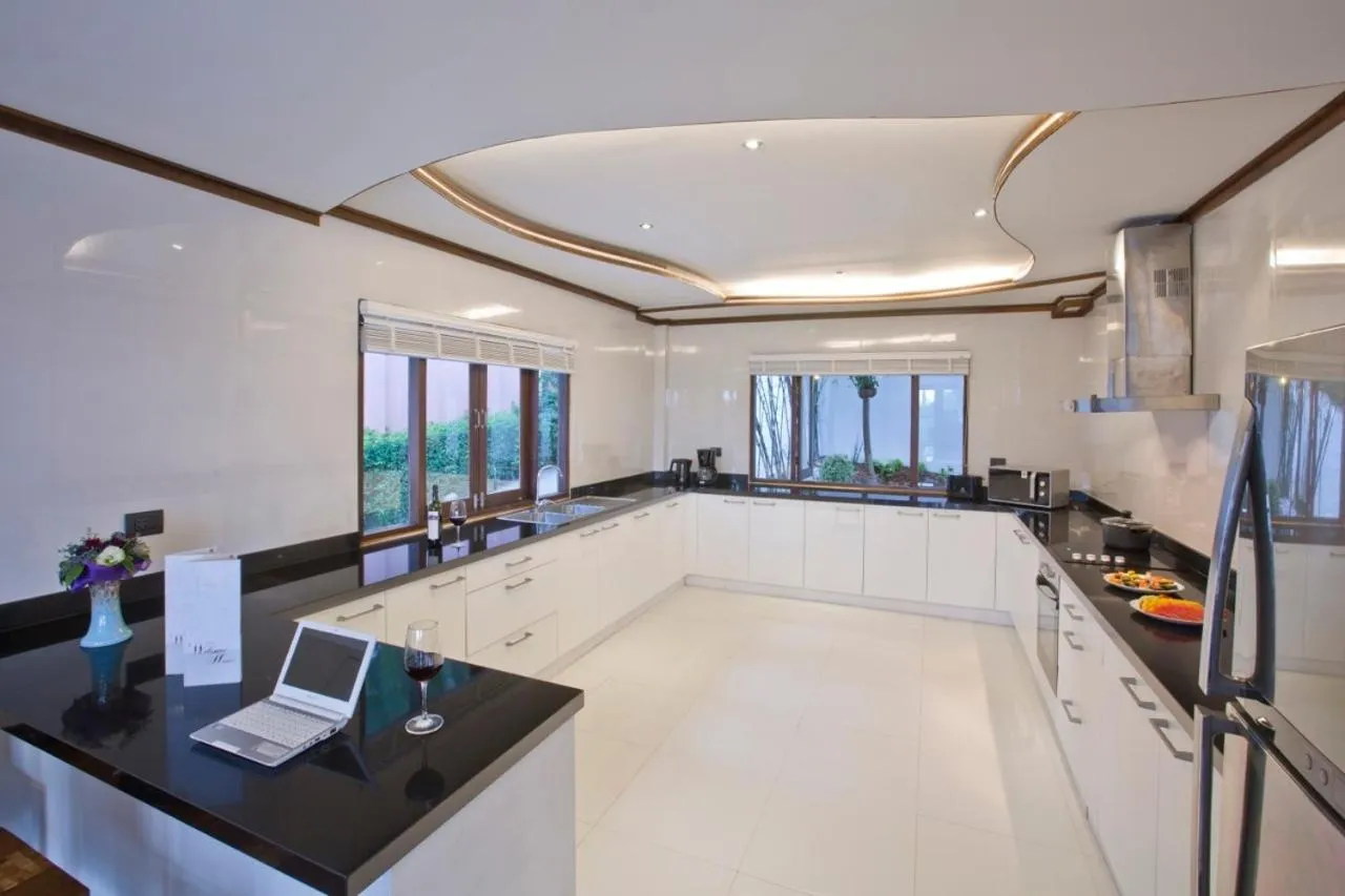Kitchen or kitchenette in Paradise Island Estate