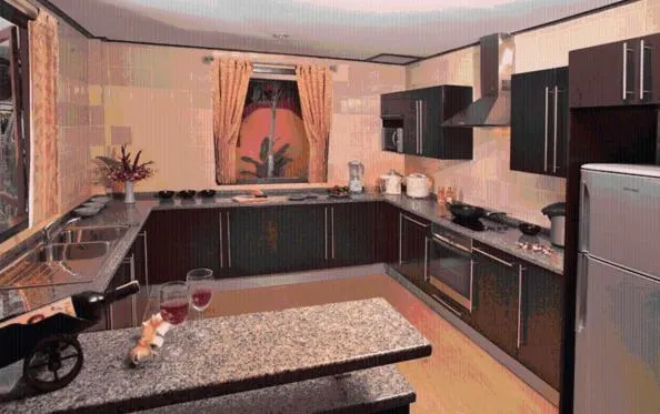 Kitchen or kitchenette in Paradise Island Estate