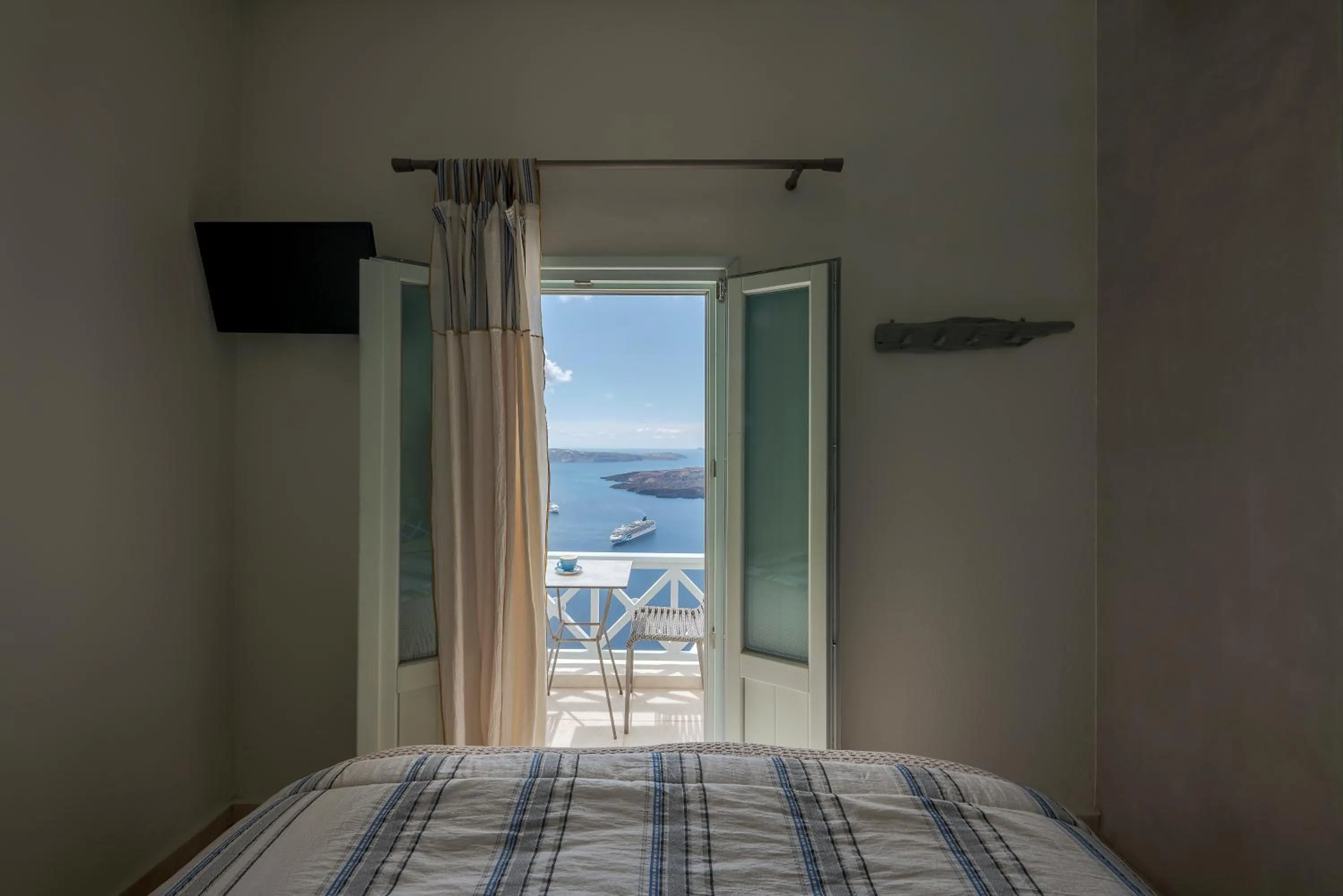 Bed in Blue Dolphins Apartments