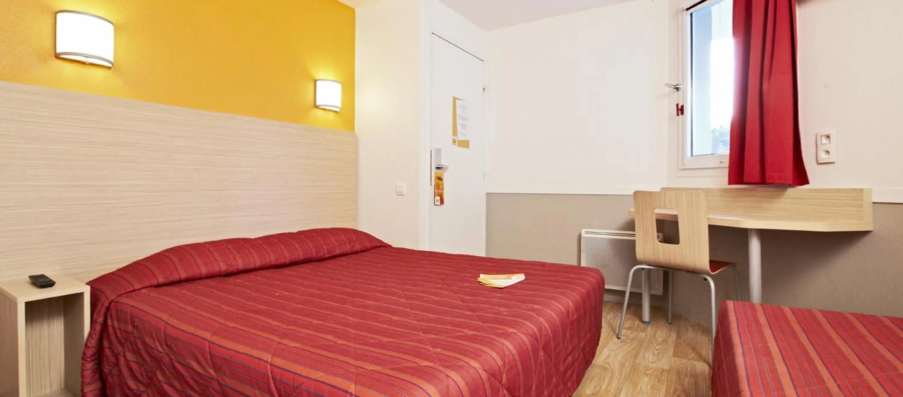 Bed in Hotel HECO Lyon sud Vienne