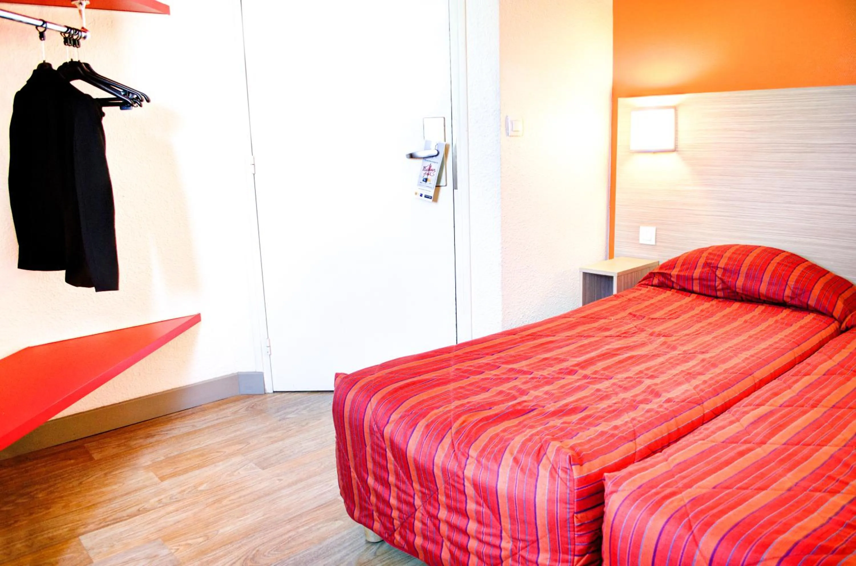 Bedroom in Hotel HECO Lyon sud Vienne