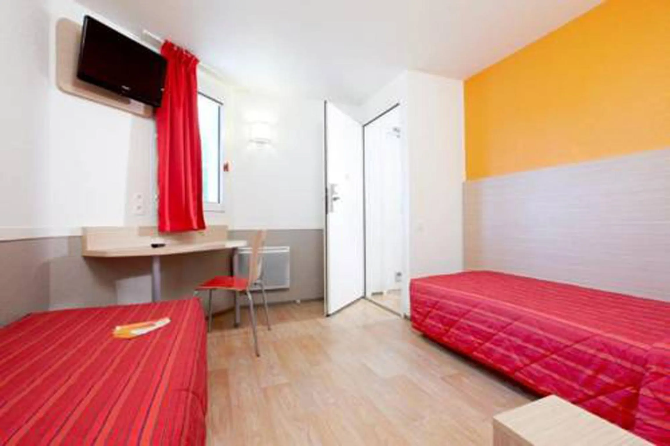 Bed in Hotel HECO Lyon sud Vienne