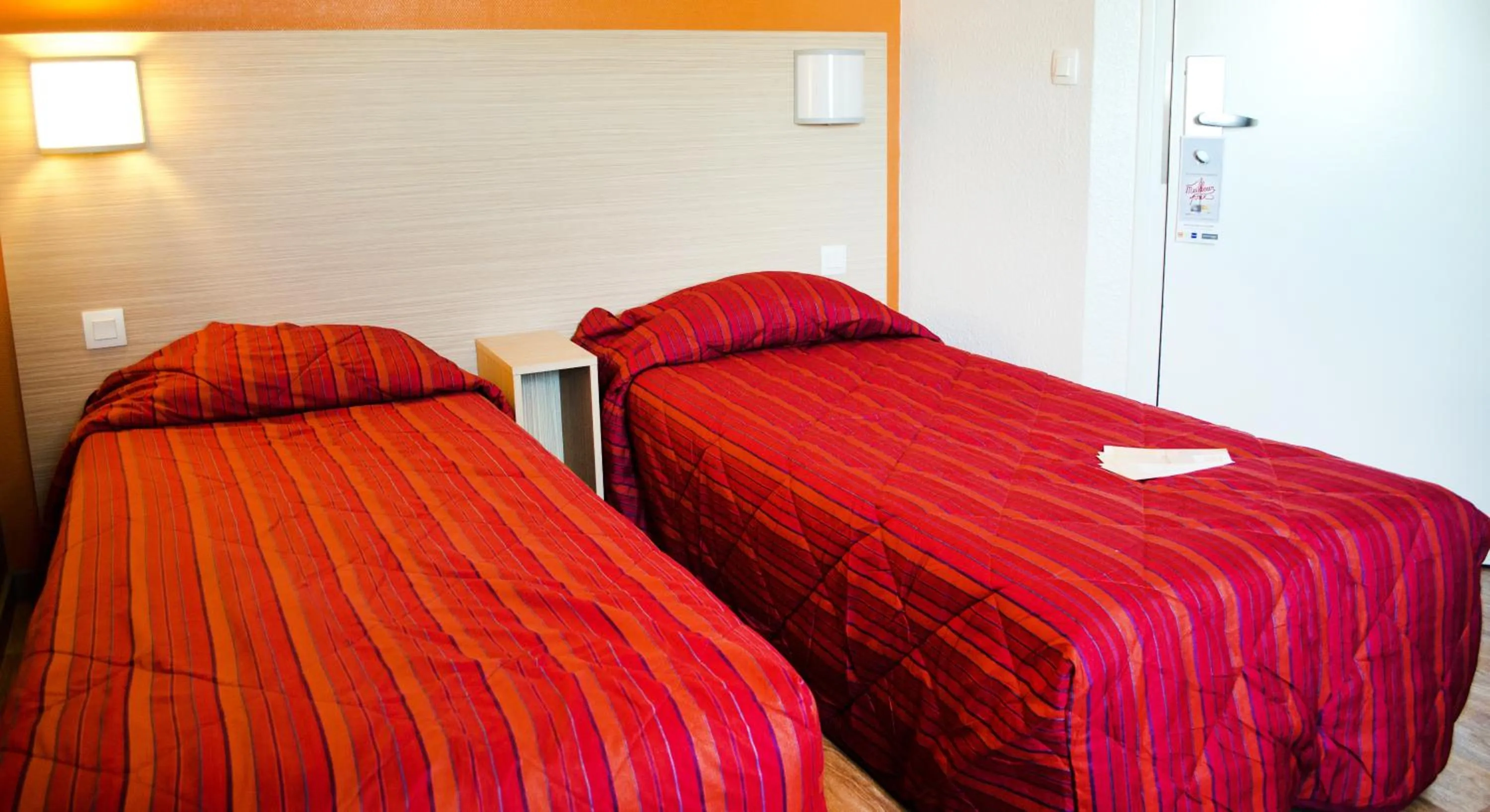 Bedroom in Hotel HECO Lyon sud Vienne