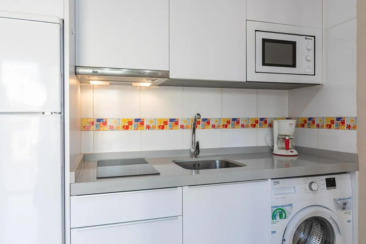 Kitchen or kitchenette in Apartamentos Guerrero