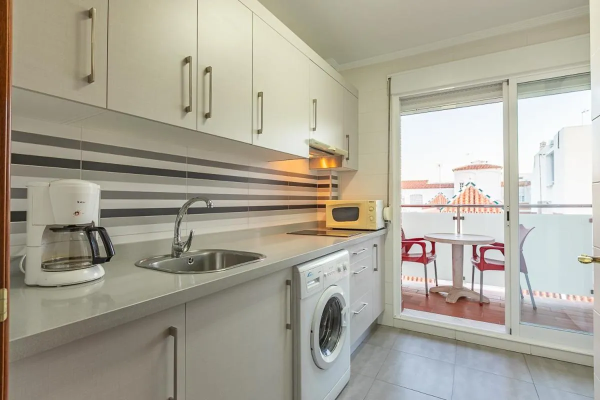 Kitchen or kitchenette in Apartamentos Guerrero