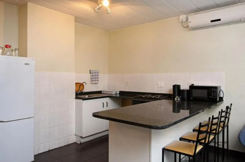 Kitchen or kitchenette in Vetho 2 Apartments OR Tambo Airport