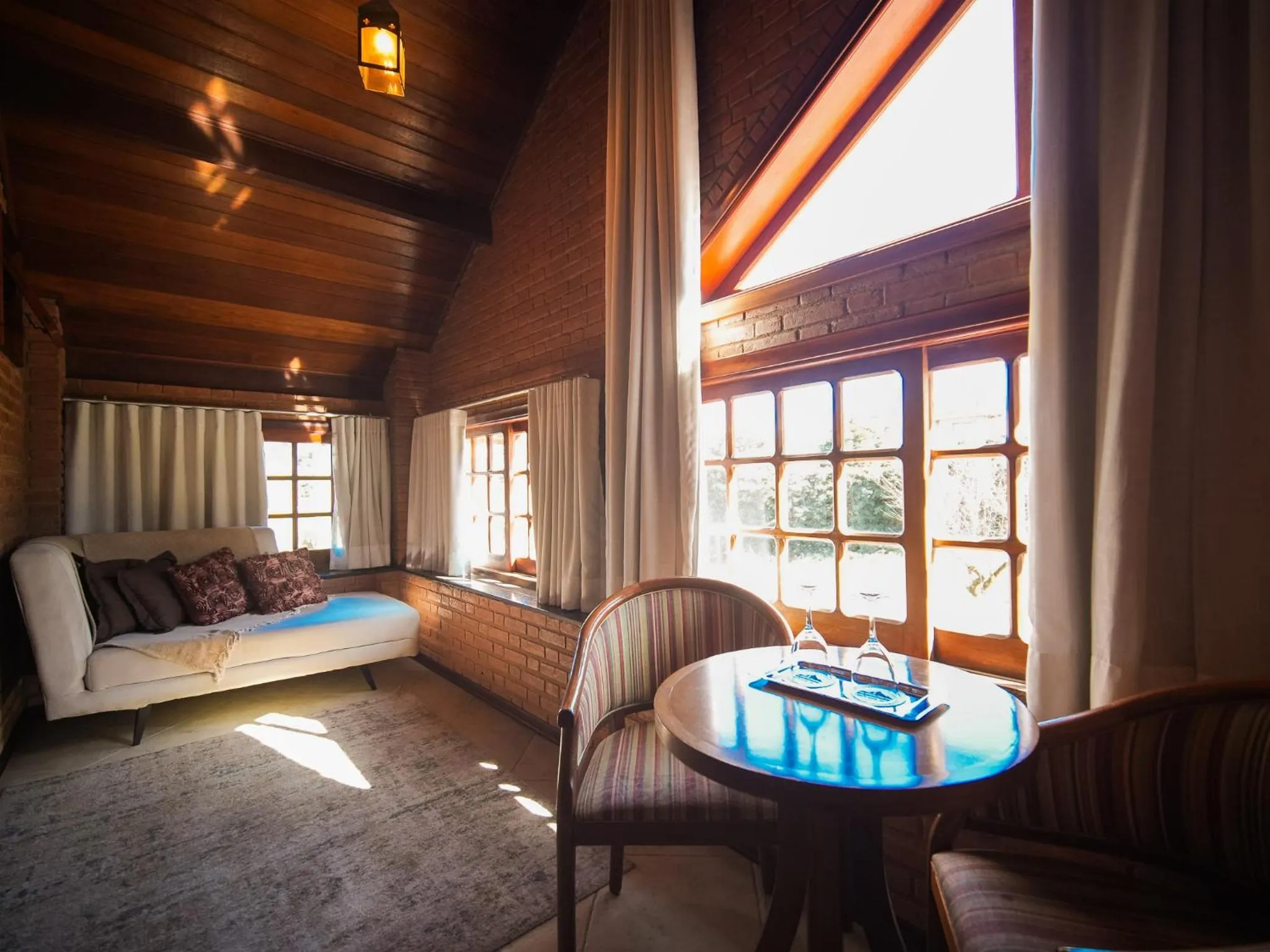 Living room, Bed in Pousada Suiça Mineira Centro