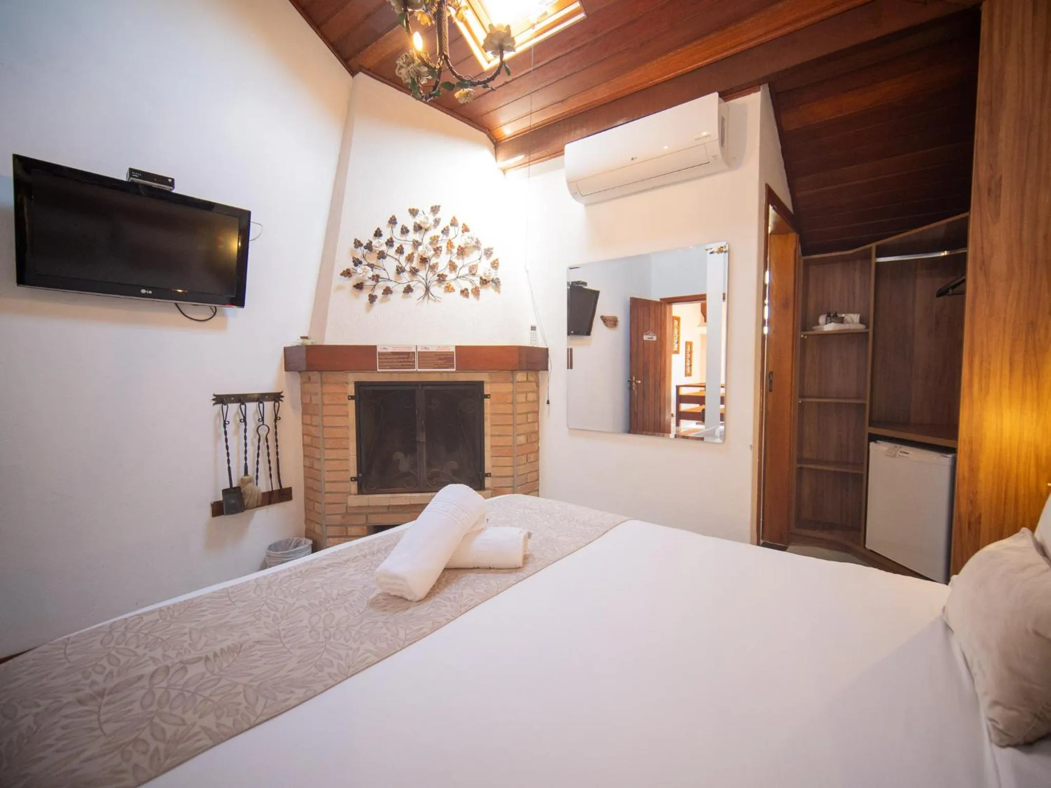 TV and multimedia, Bed in Pousada Suiça Mineira Centro