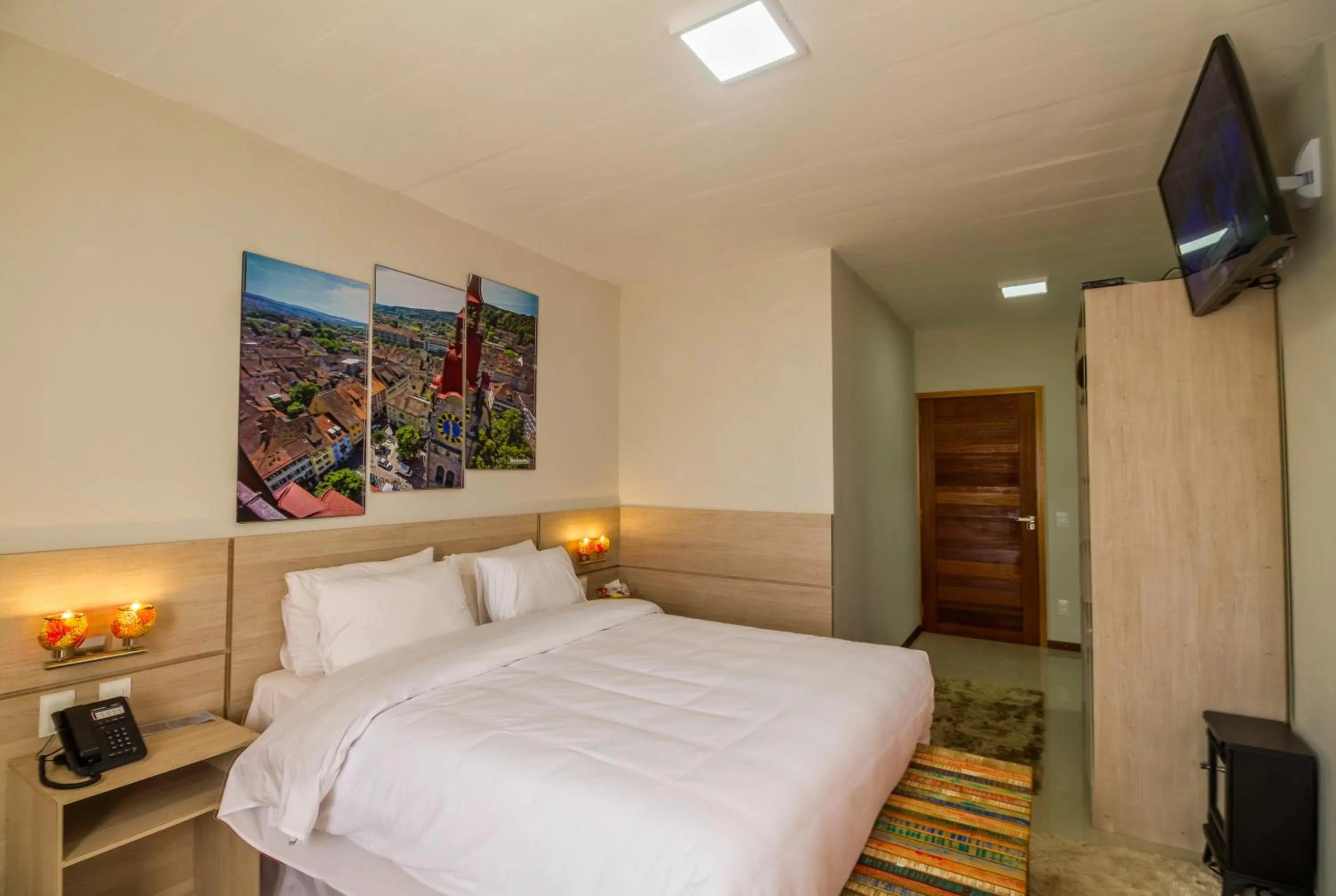 Photo of the whole room, Bed in Pousada Suiça Mineira Centro