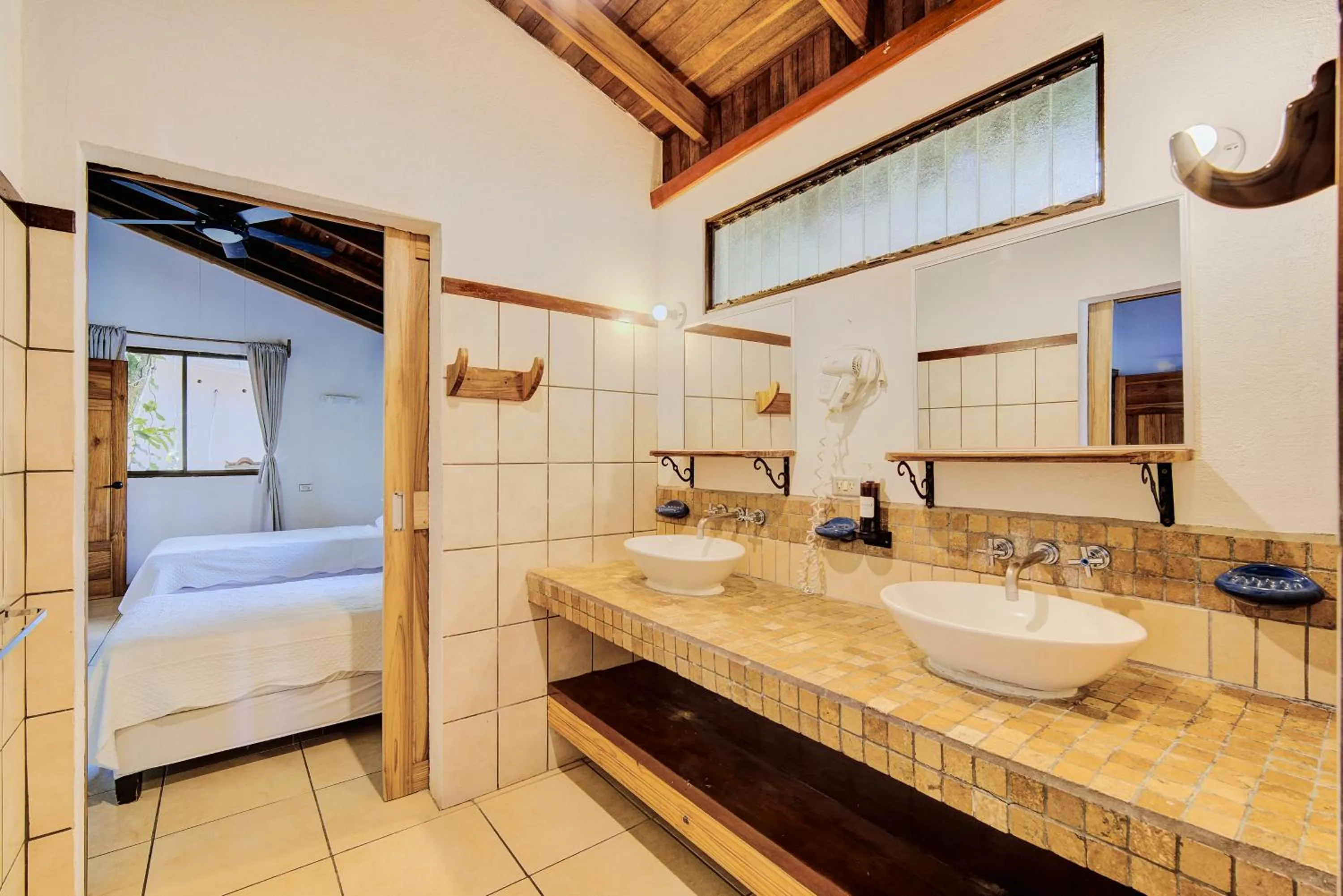 Bed in Cariblue Beach and Jungle Resort