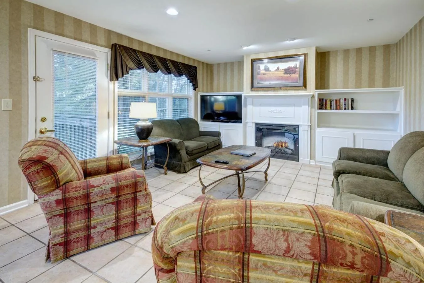 Living room in Pocono Mountain Villas by Exploria Resorts