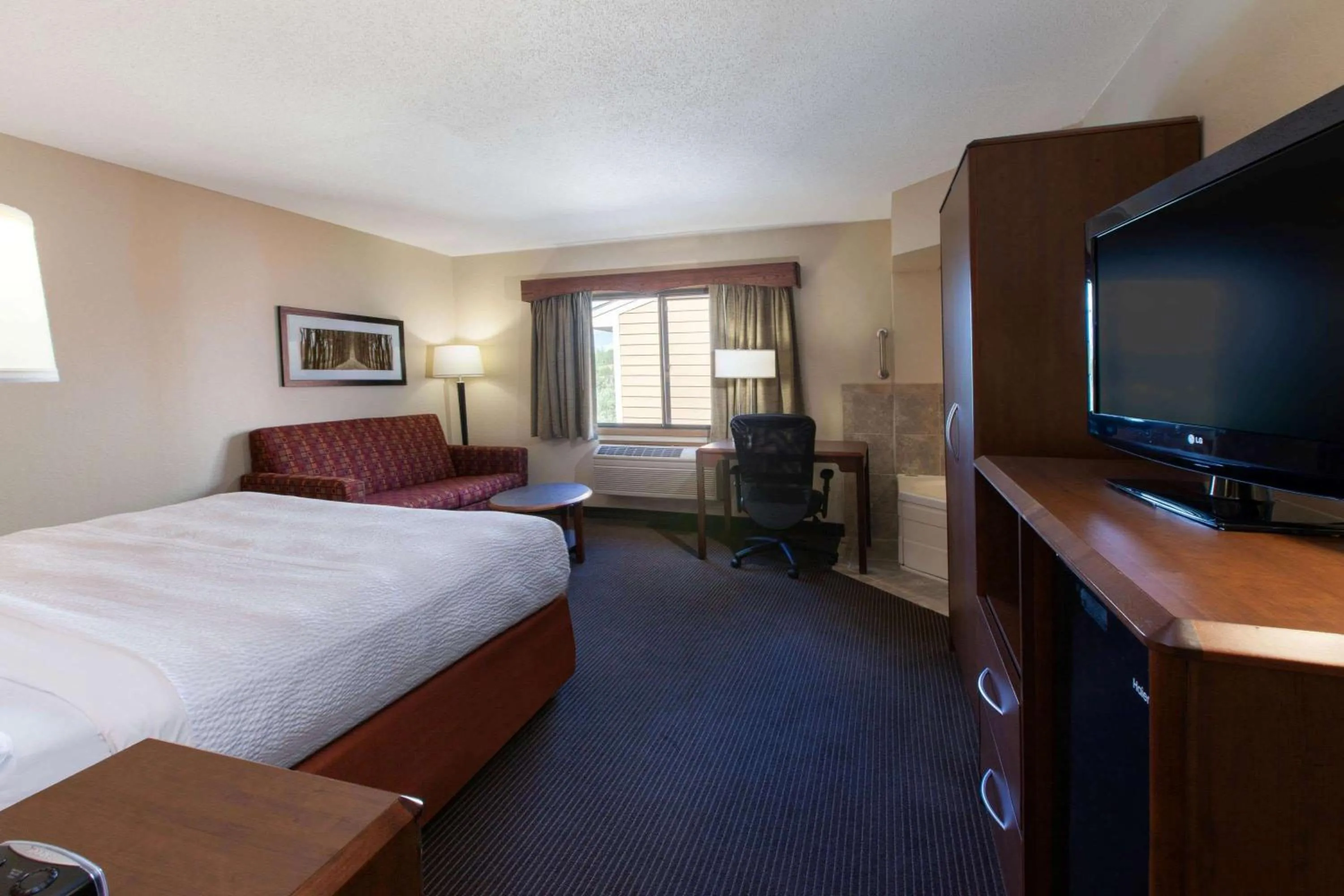 Photo of the whole room, Bed in AmericInn by Wyndham Iron River
